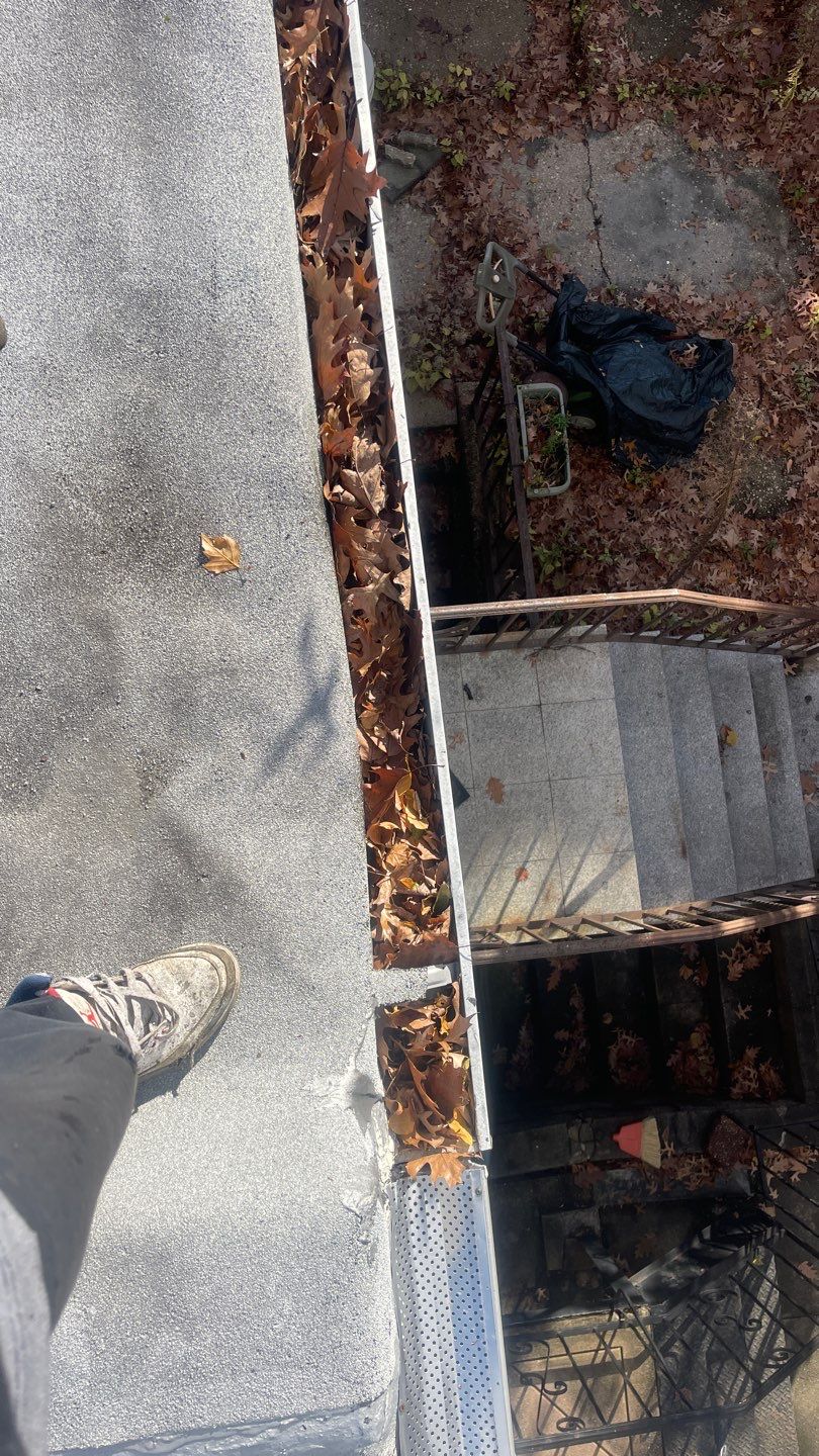 Flat Roof Cleanup and gutter cleaning.  by Above All Gutters 