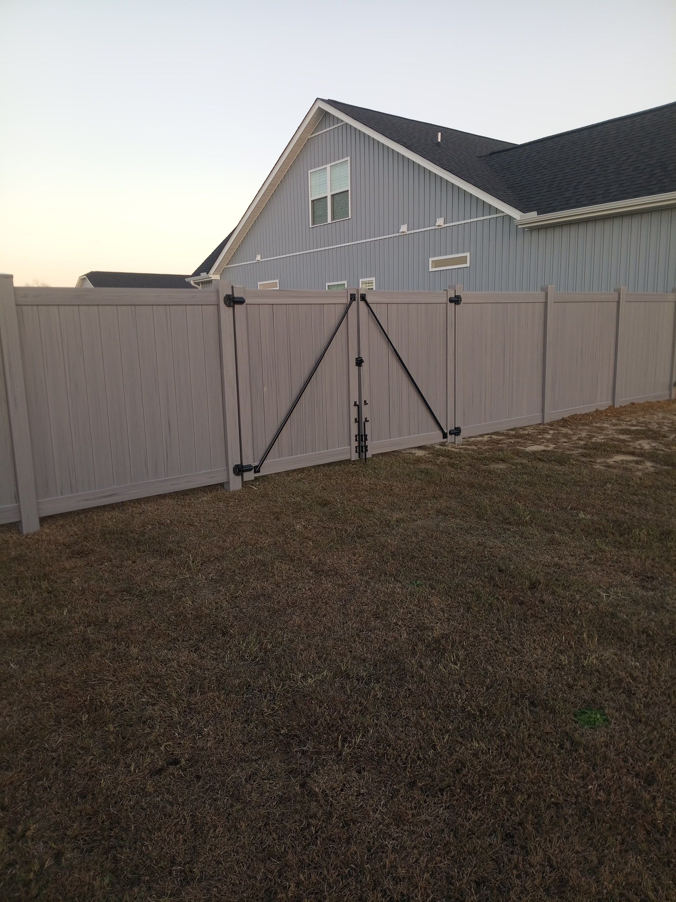 Gray Vinyl Project in Grimesland NC by Superior Fence and Rail