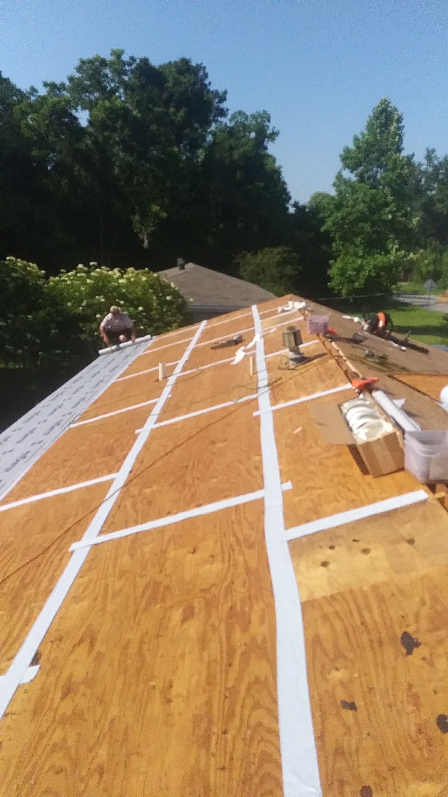 Residential Roofing Installation using Roof Replacement by American Roofing & Construction LLC
