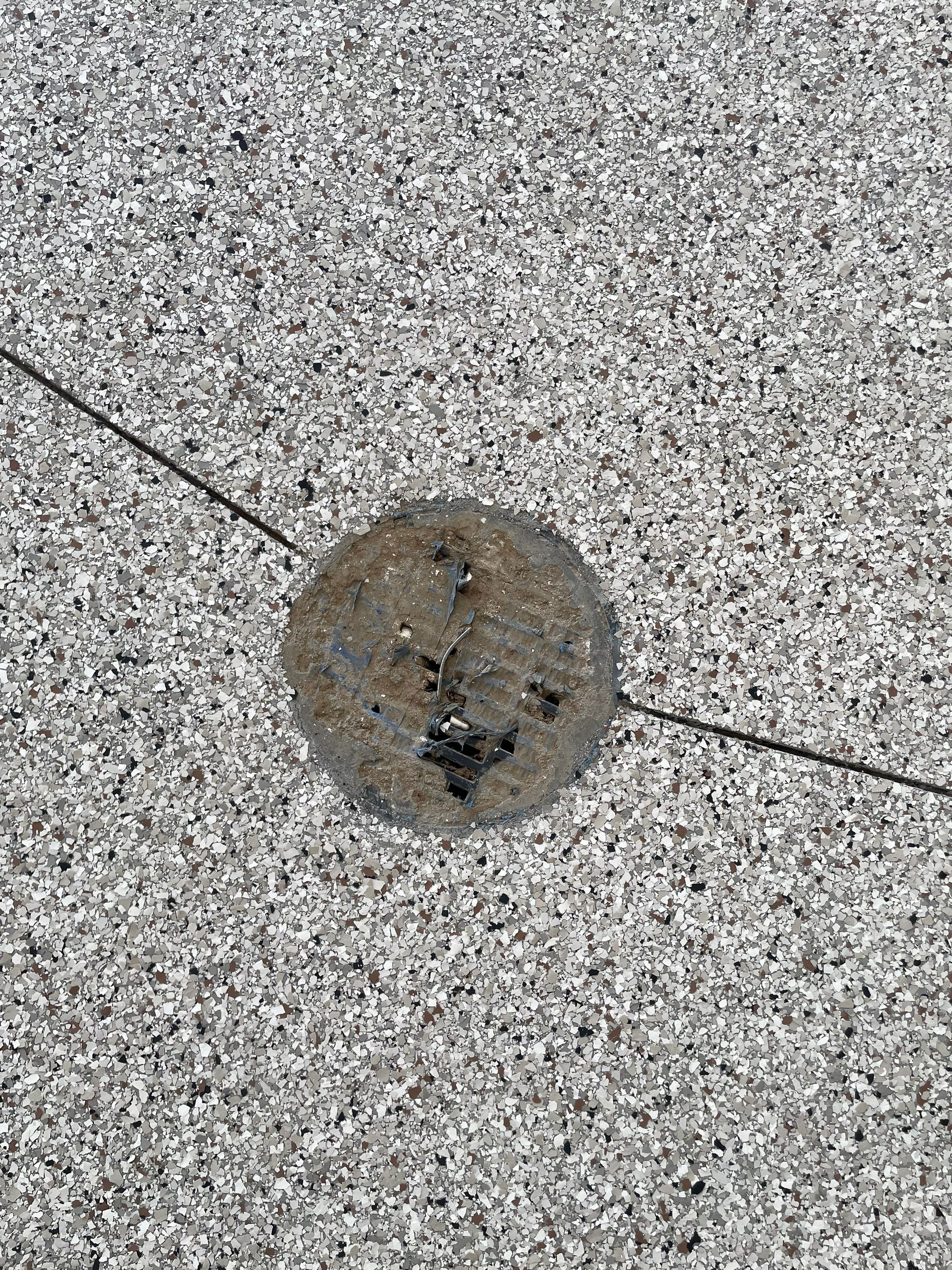 Grey Speckled Garage Floor Coating in Sioux Falls by Select Painting, Coatings & Garage Cabinets