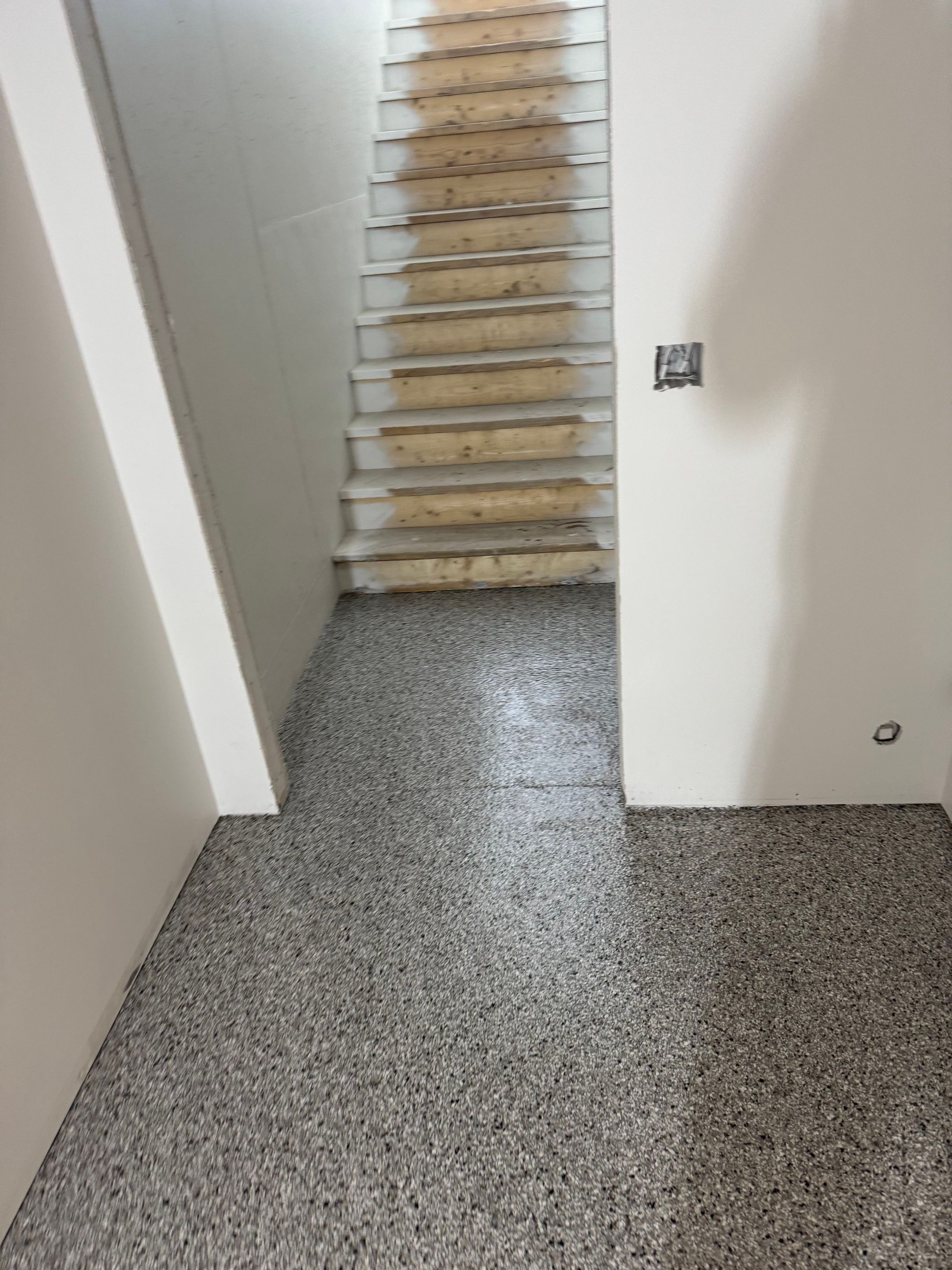 Custom Garage and Basement Epoxy Floor Coating in Menno by Select Painting, Coatings & Garage Cabinets