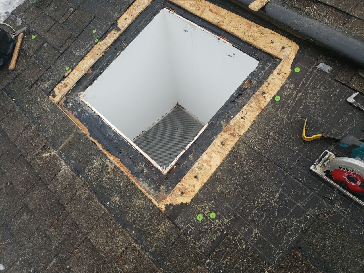 Skylight Removal using Shingle Repair by The Roof Doctor
