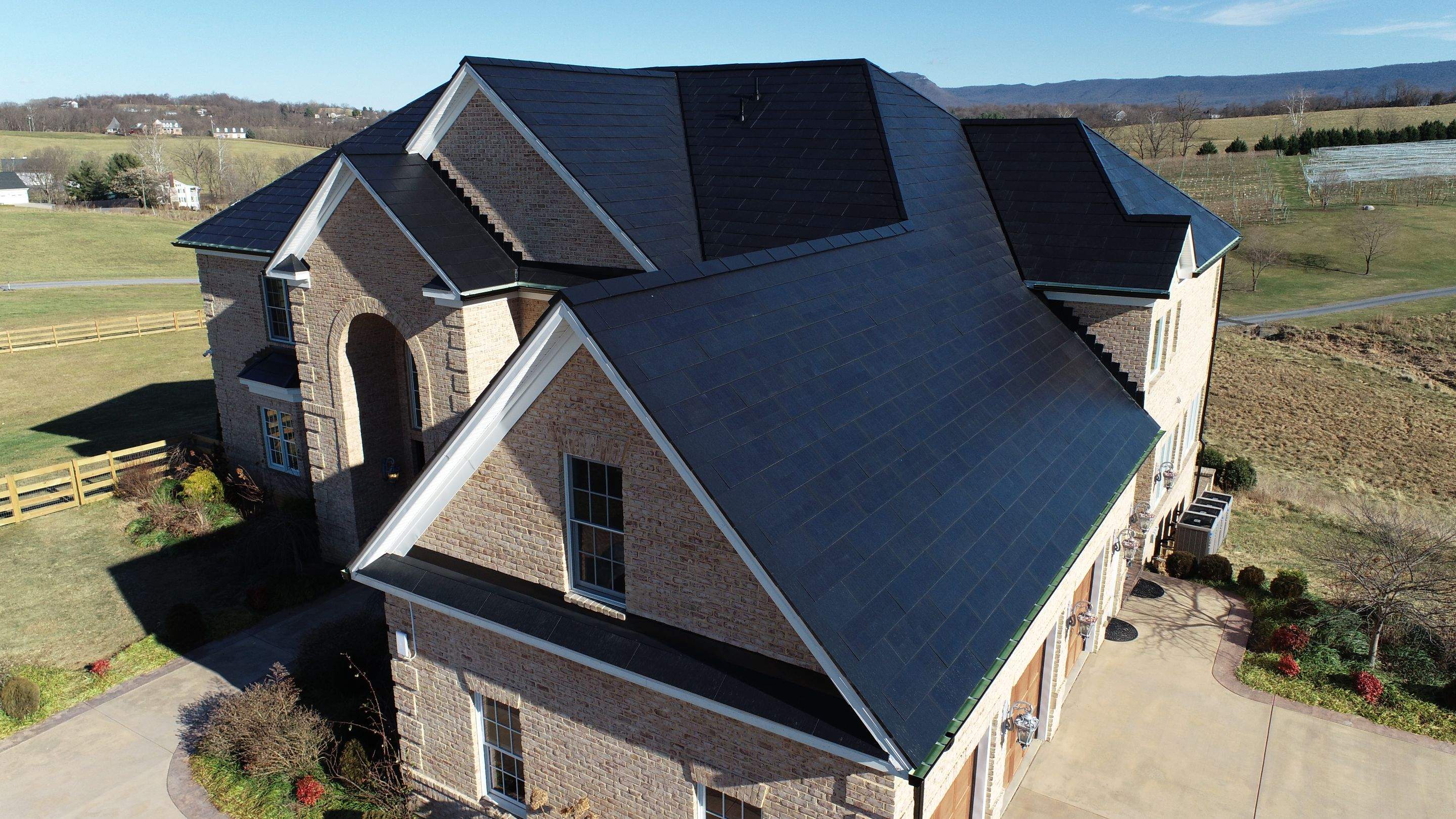 Tesla Solar Roof Replacement  by American Home Contractors