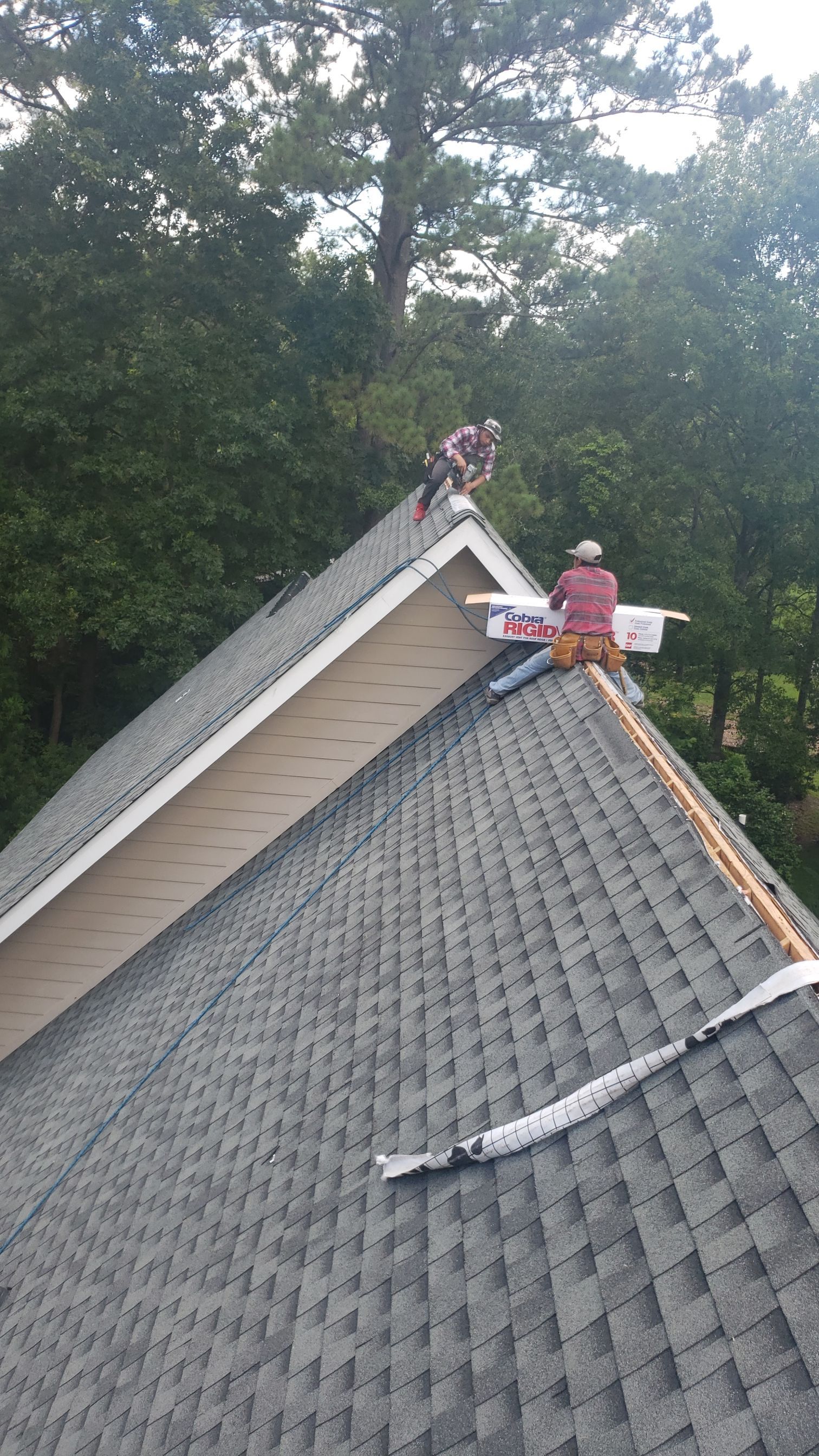 Residential Roofing Installation using Roof Replacement by American Roofing & Construction LLC