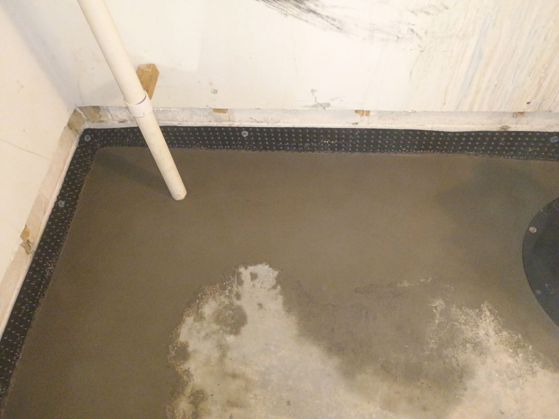 Interior Drain Tile Installation in South Minneapolis by Waterproofing Northeast