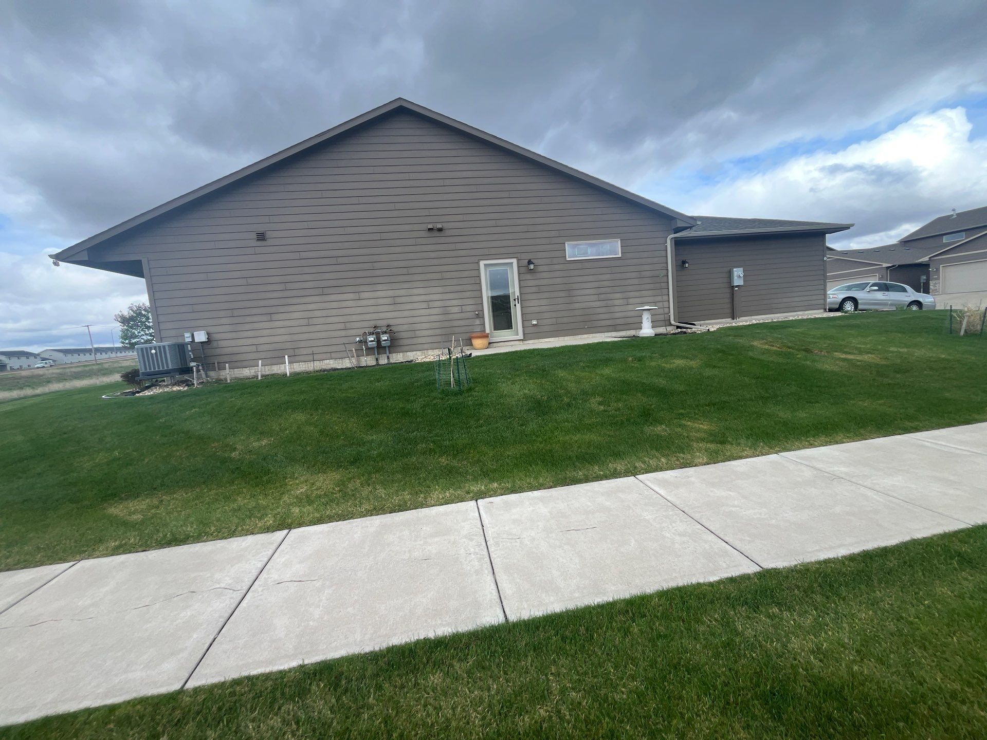 Exterior Painting for Multi-Unit Townhomes in Sioux Falls by Select Painting, Coatings & Garage Cabinets