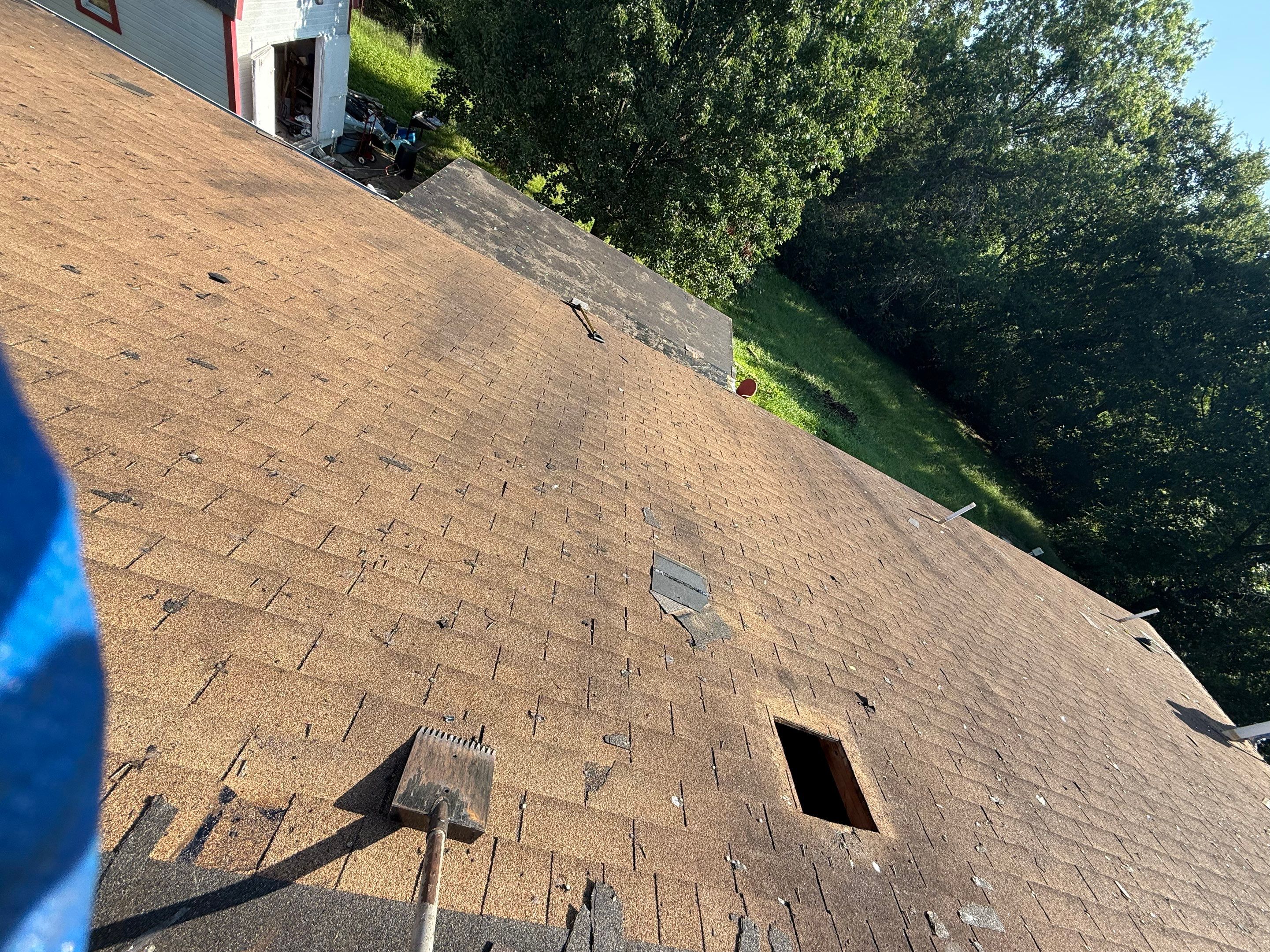 2 layers tear off & installation of new architectural shingles. by In & Out Construction & Remodeling, LLC