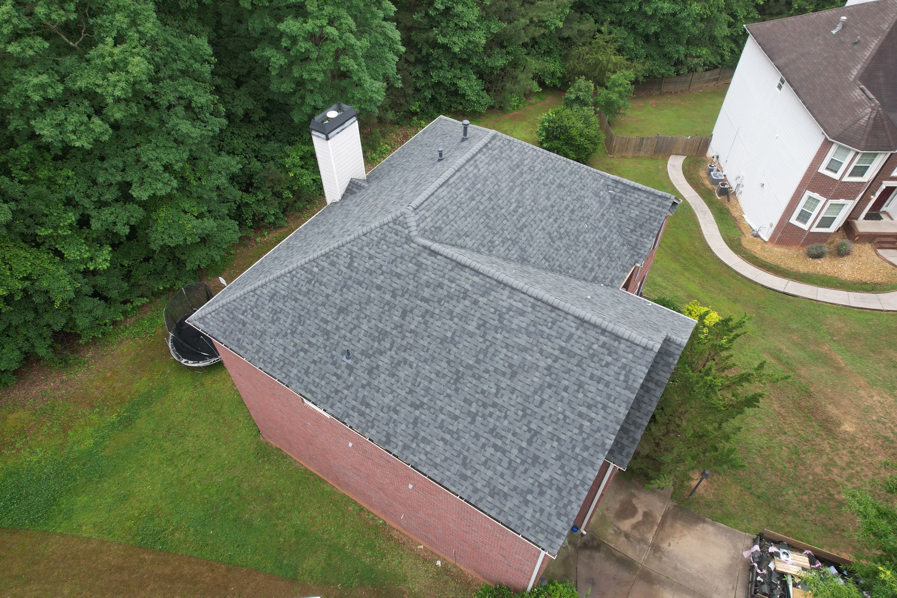 Residential Roof Replacement using Owens Corning Estate Gray by Inspector Roofing and Restoration