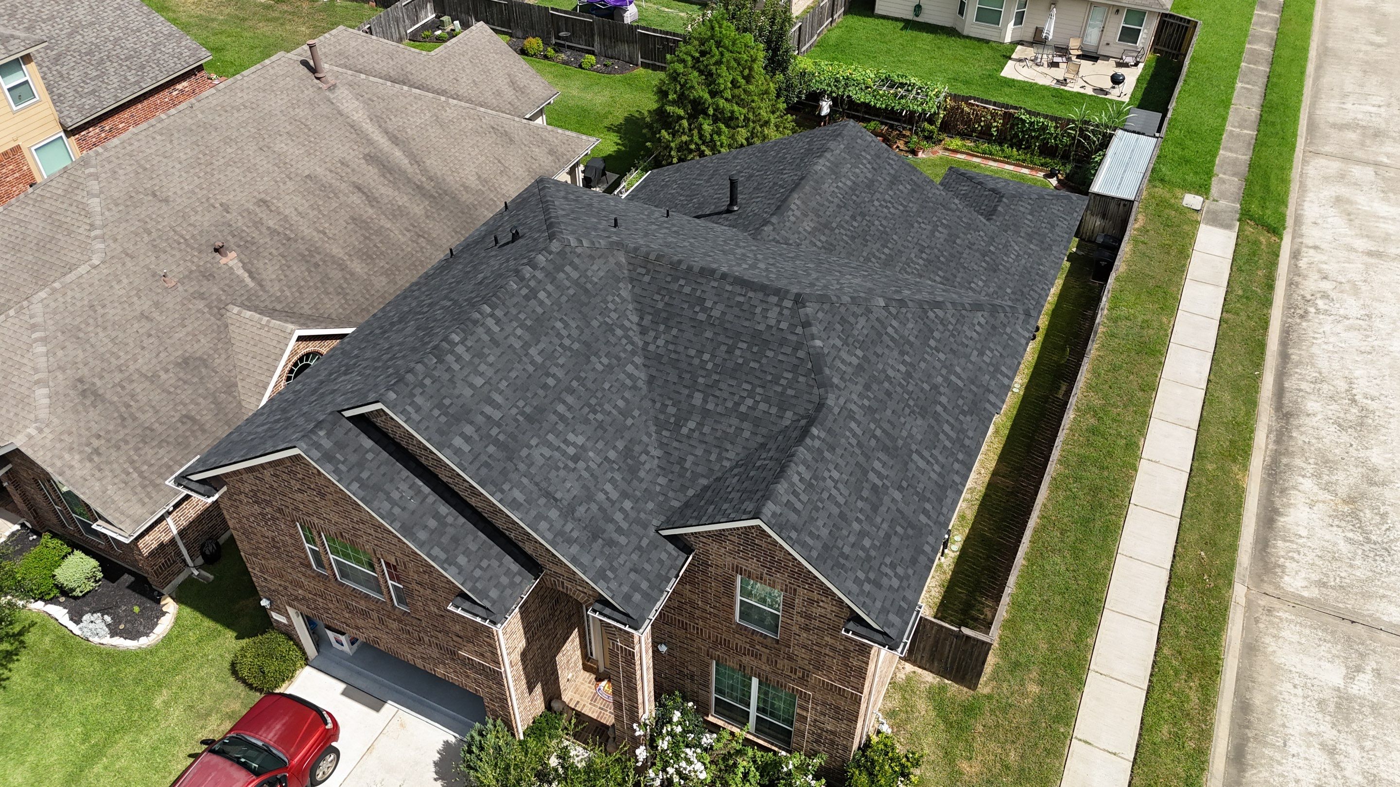 Residential Roofing Installation using IKO Dynasty after Storms in Cypress by Core Four Roofing