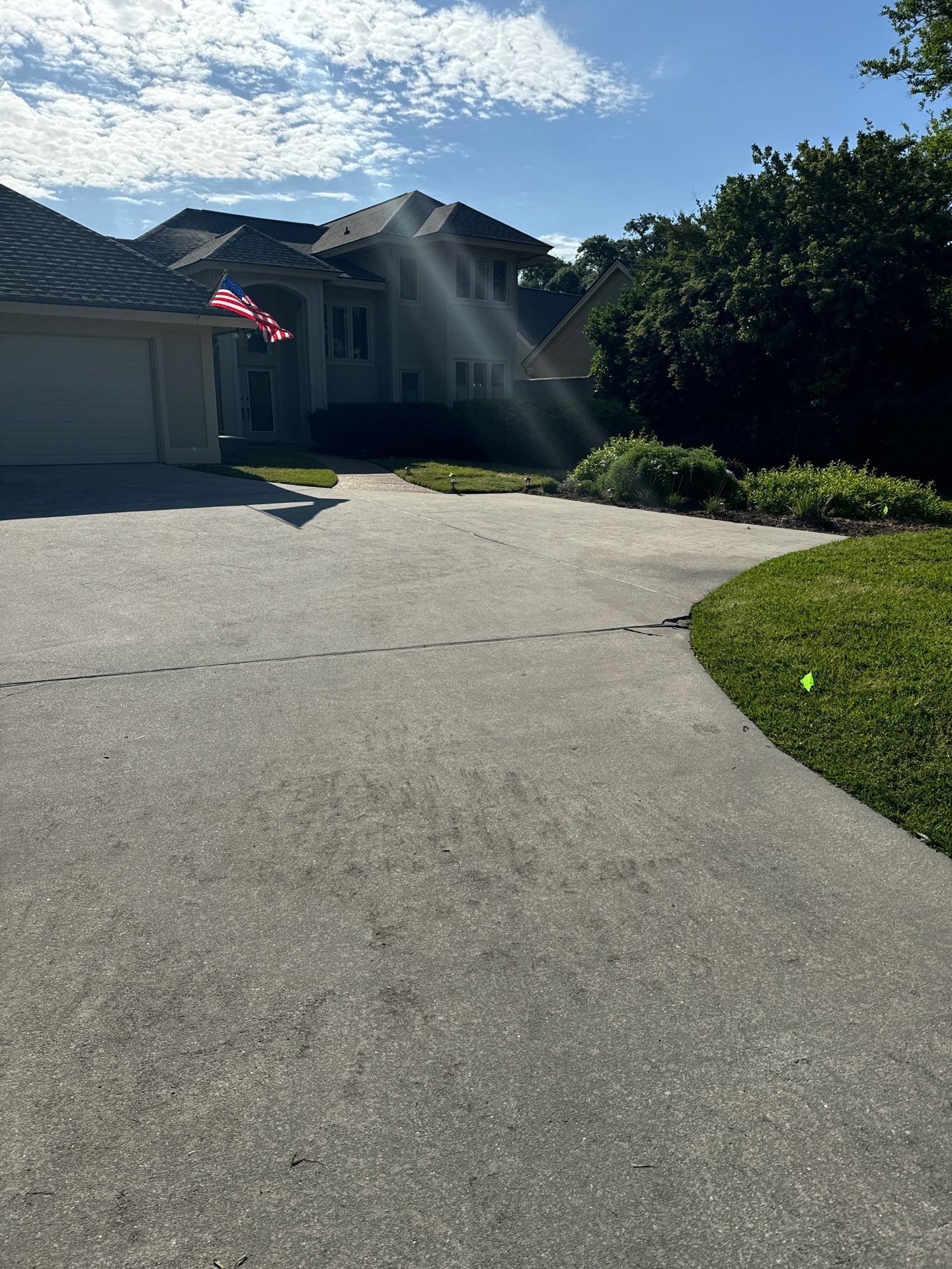 Concrete Driveway Repair with Decorative Paver Accents in Hilton Head Island by Lowcountry Scapes, LLC