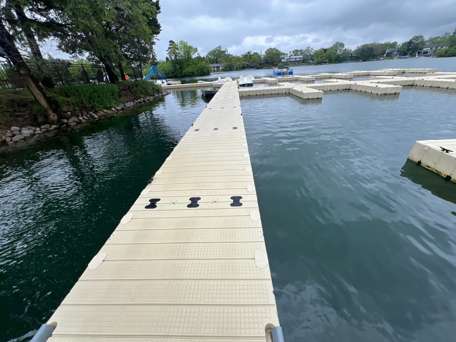 Power washing of floating dock by Northern Power Washing LLC.