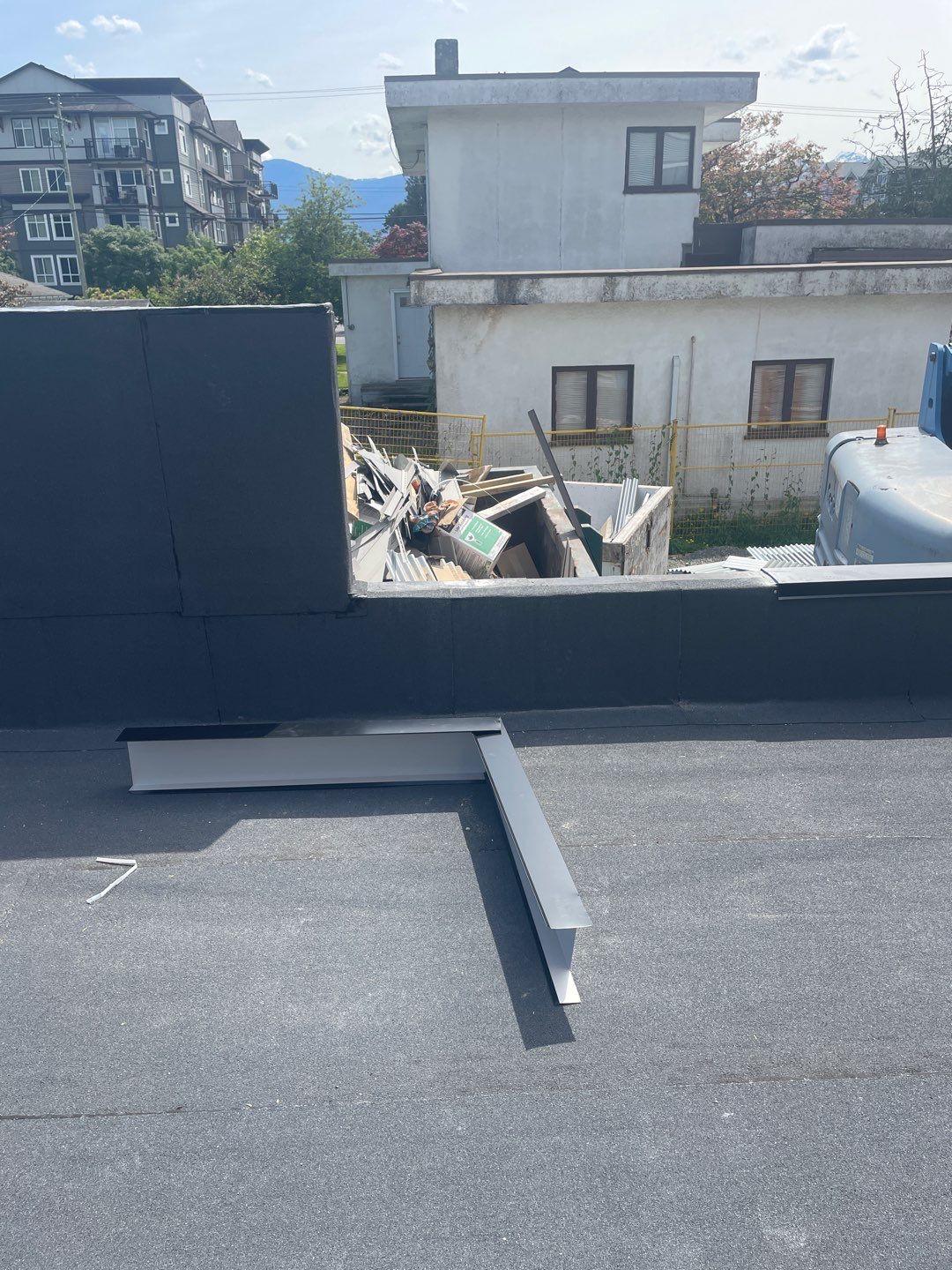 Large apartment with sbs, shingles and prolok metal  by Top Notch Roofing Inc