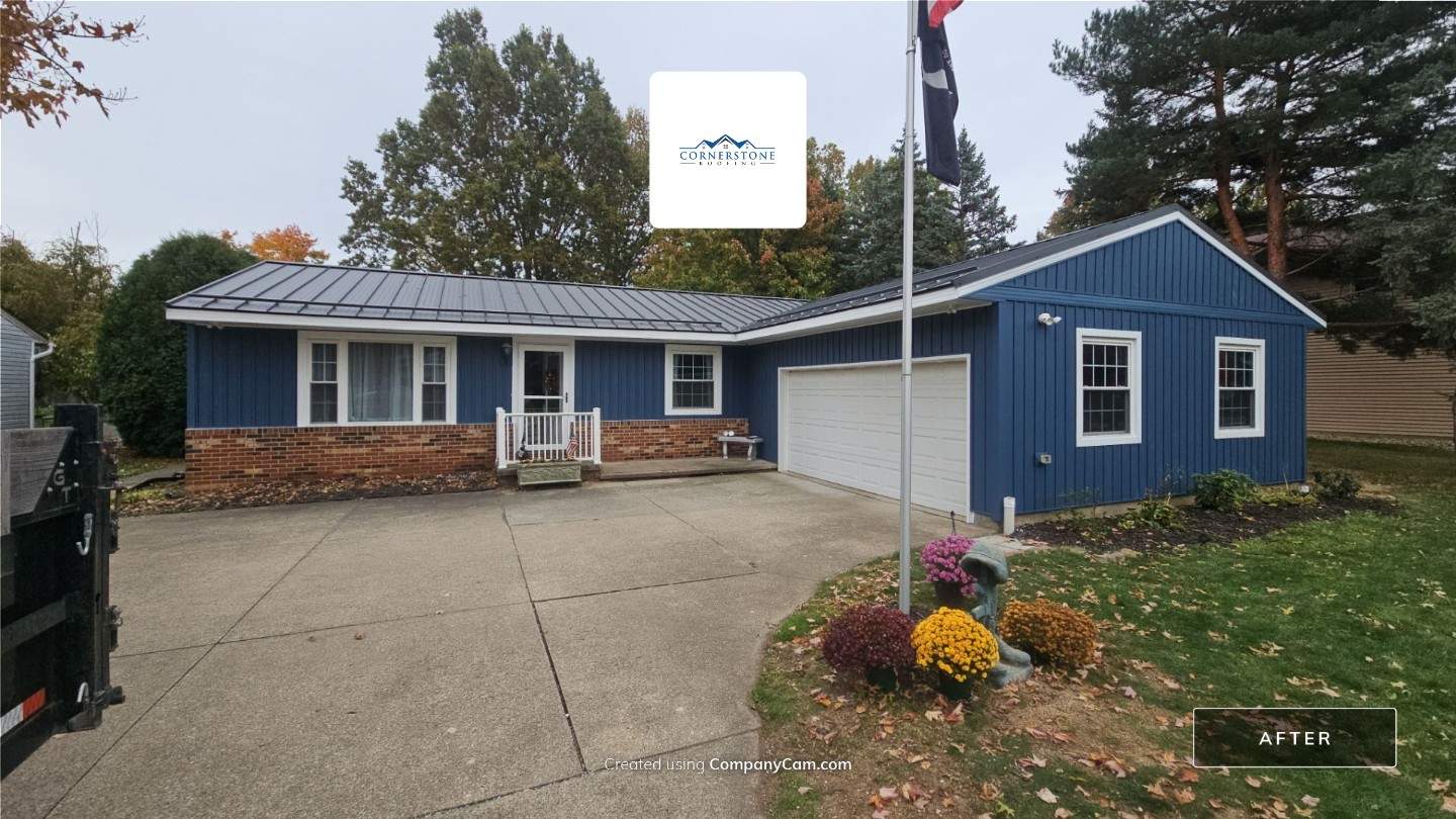 Wadsworth Exterior Transformation Featuring Blue Vertical Siding and Metal Roofing by Cornerstone Roofing And Siding