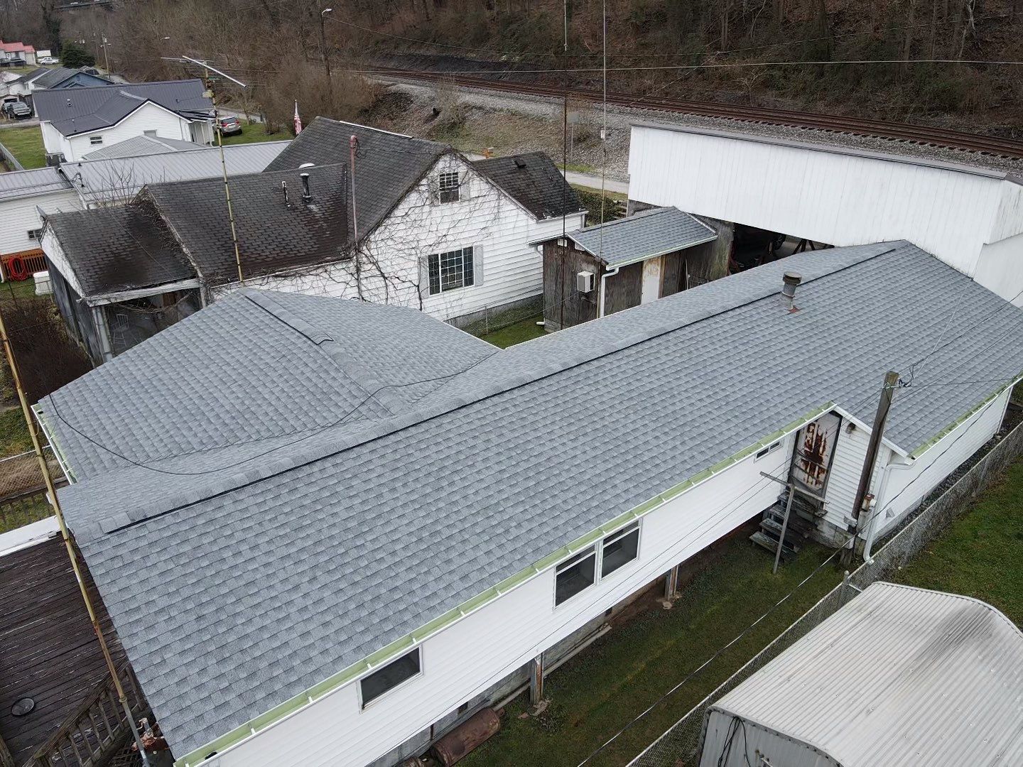 Residential Roofing Installation using GAF Timberline HDZ Oyster Grey by Rainstoppers Roofing