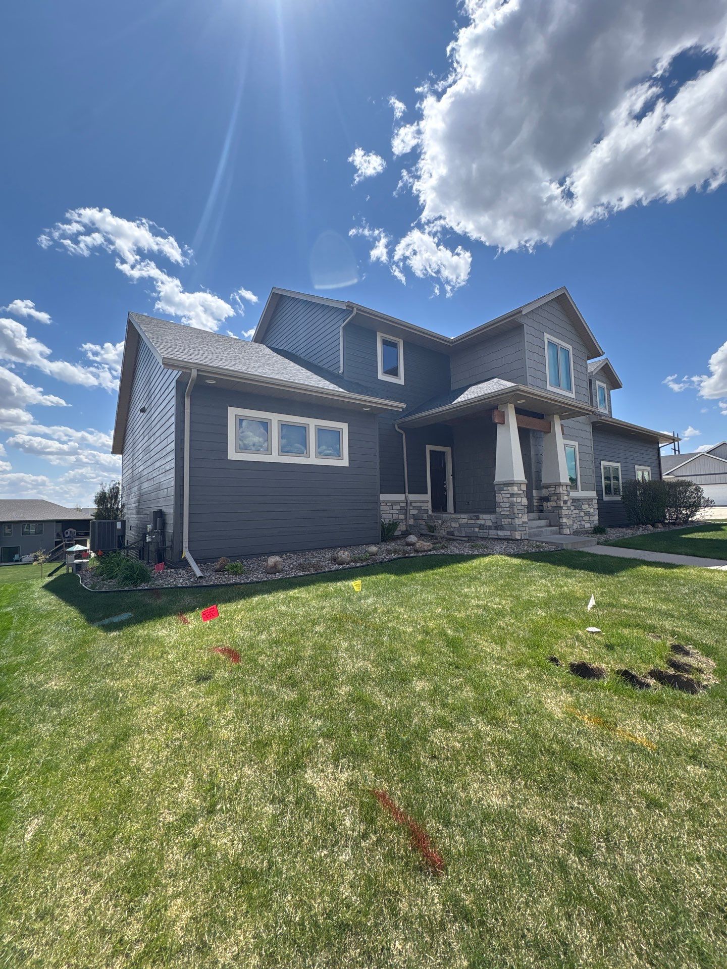 Residential Exterior Painting and Color Update in Sioux Falls by Select Painting, Coatings & Garage Cabinets