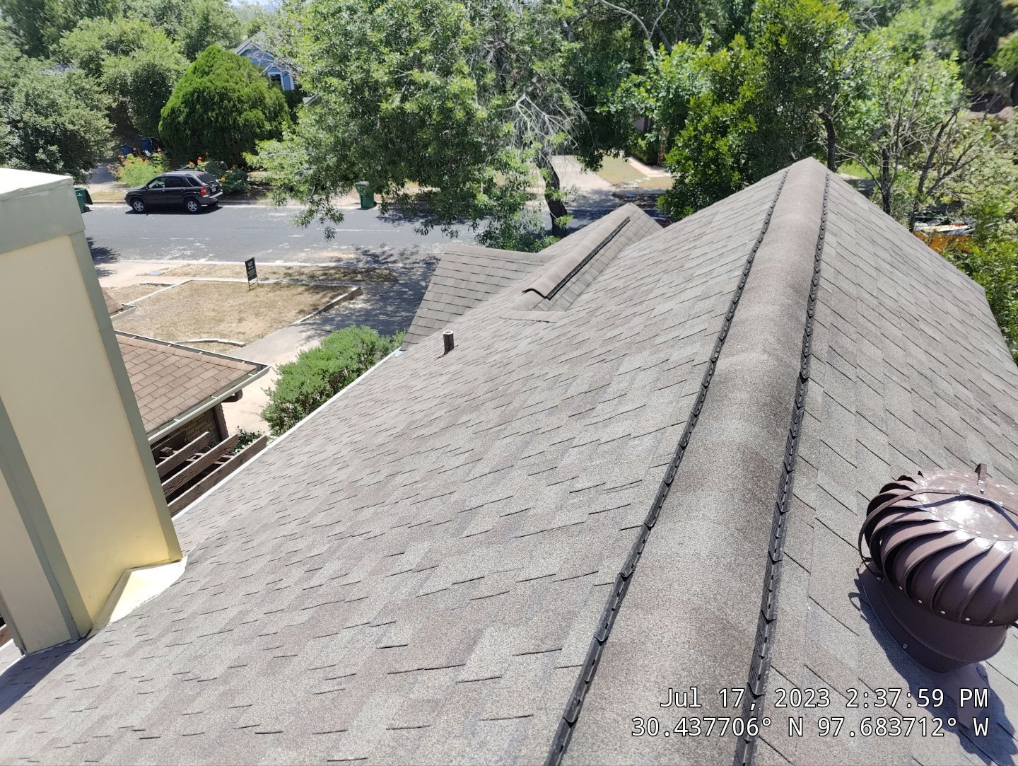 Residential Roofing Installation using Owens Corning Duration TruDef Driftwood by DeZign Roofing & Exteriors
