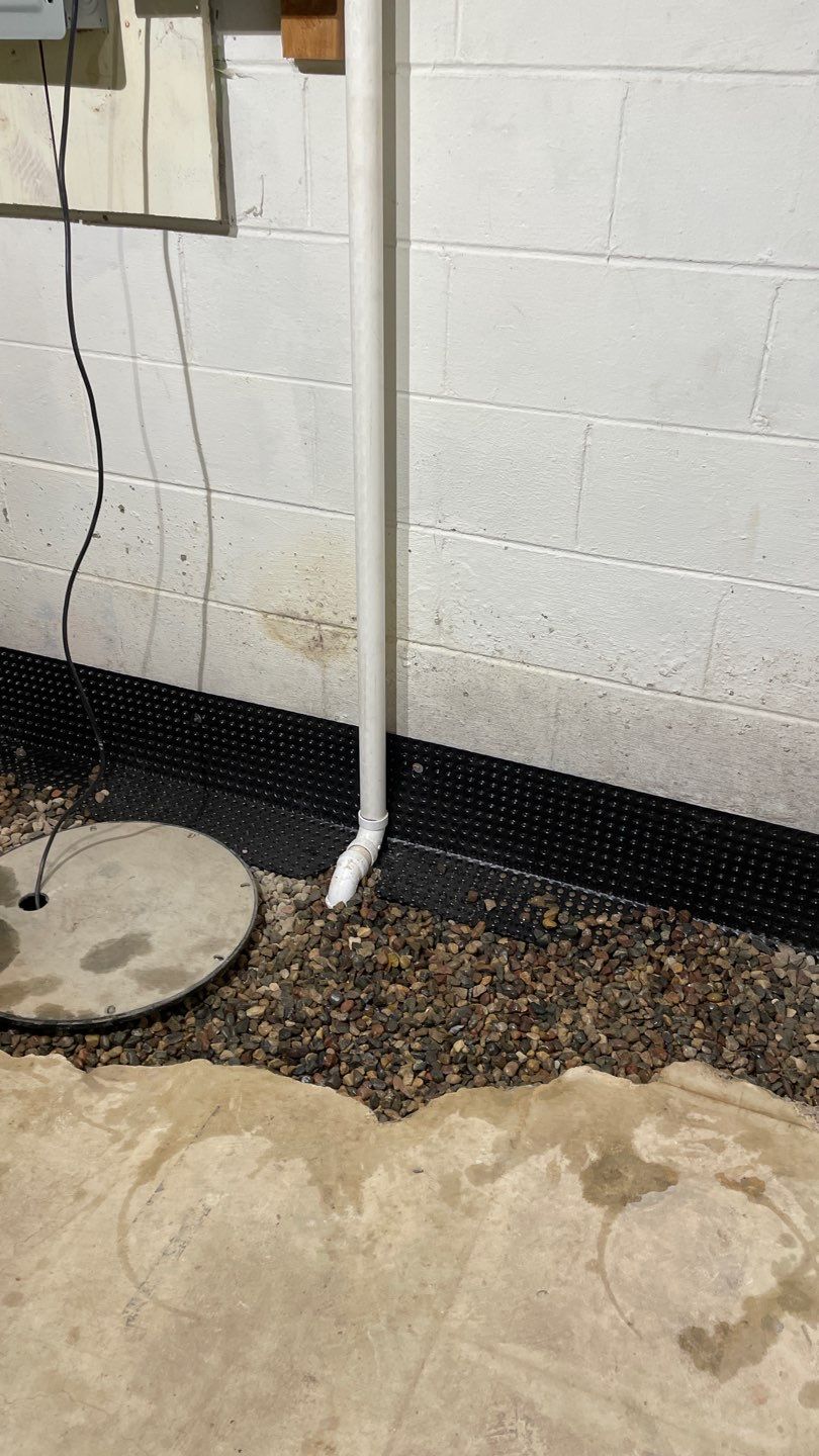 Drain tile & a sump pump for Ruth by Waterproofing Northeast
