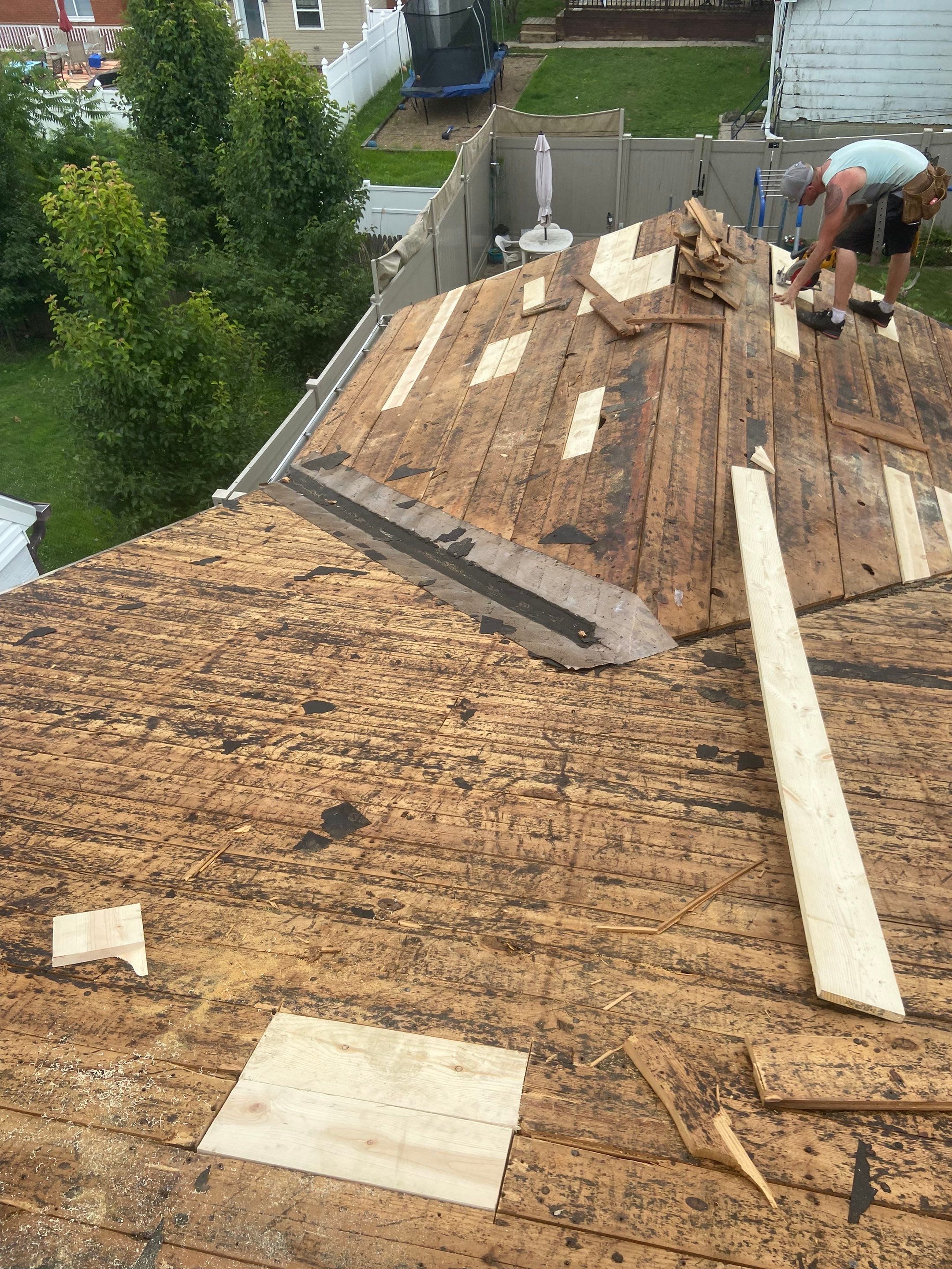 Metal Roofing, Skylights, Porch Build by Secure Construction Company Inc