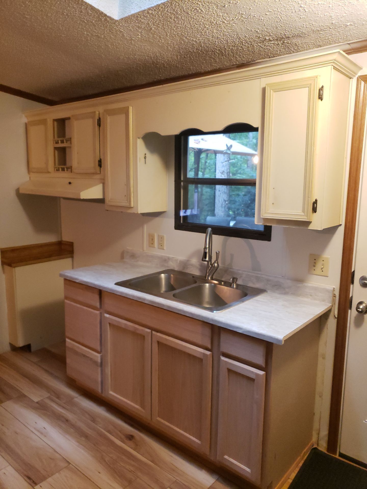 Stunning Kitchen Transformation with Raw Hickory Cabinets by A Step Above Handy LLC 