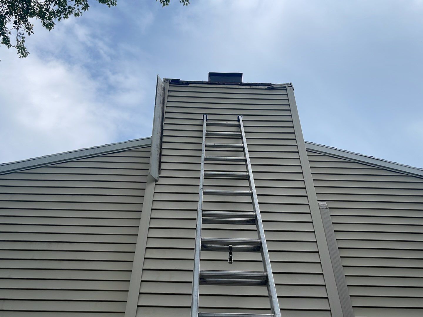 Gutter Cleaning Chimney top repair by A Plus Exterior