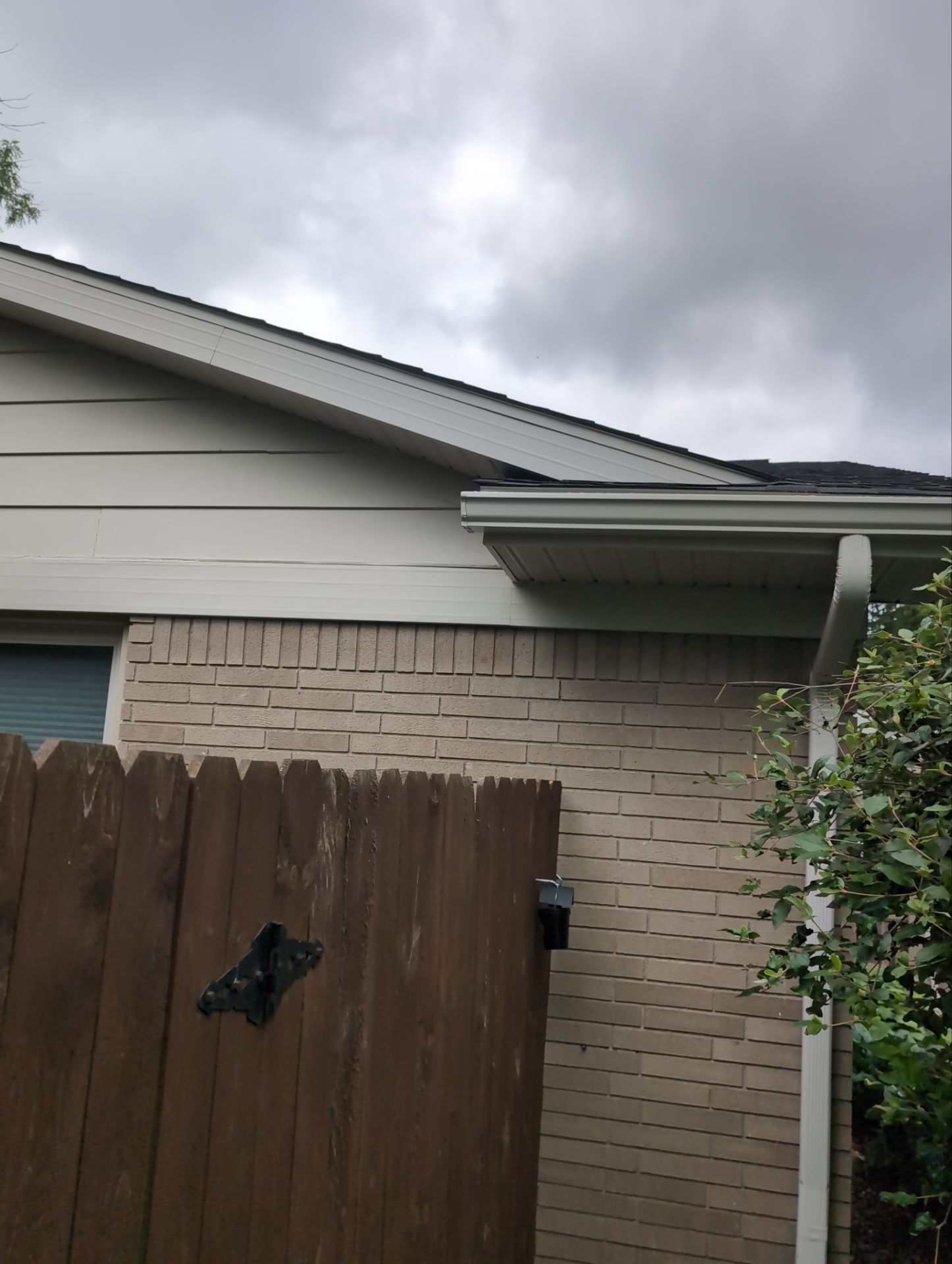 Installing new Roof, Fascia, Soffit, and Gutters. New custom trim around garage door. by Acme Exteriors