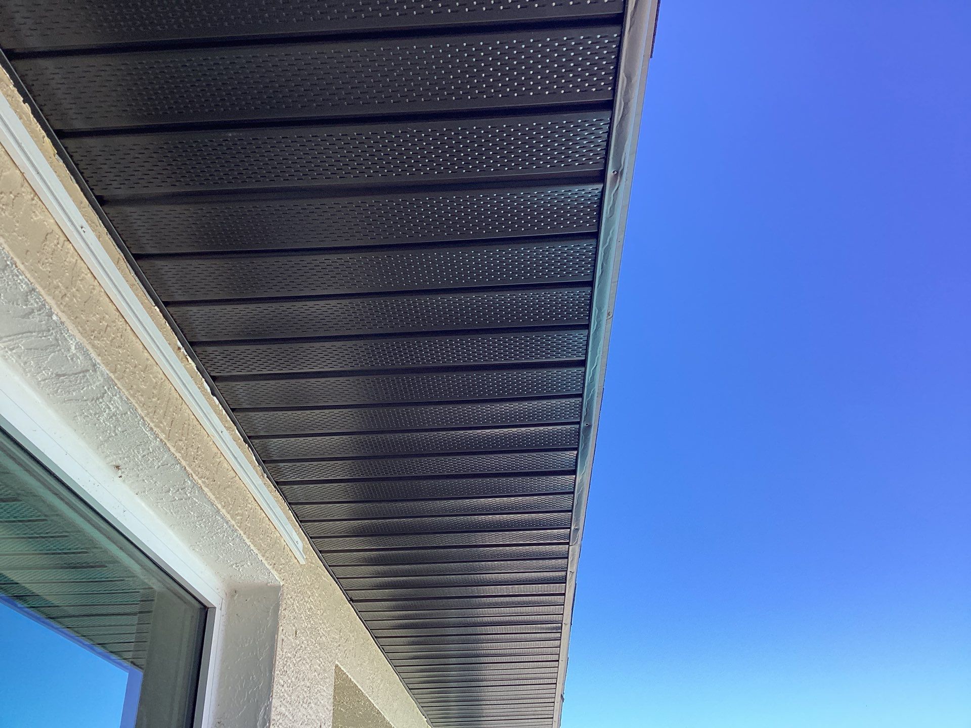 Musket Brown Gutter Installation and Soffit Fascia in Cape Coral FL by Gutter Professors