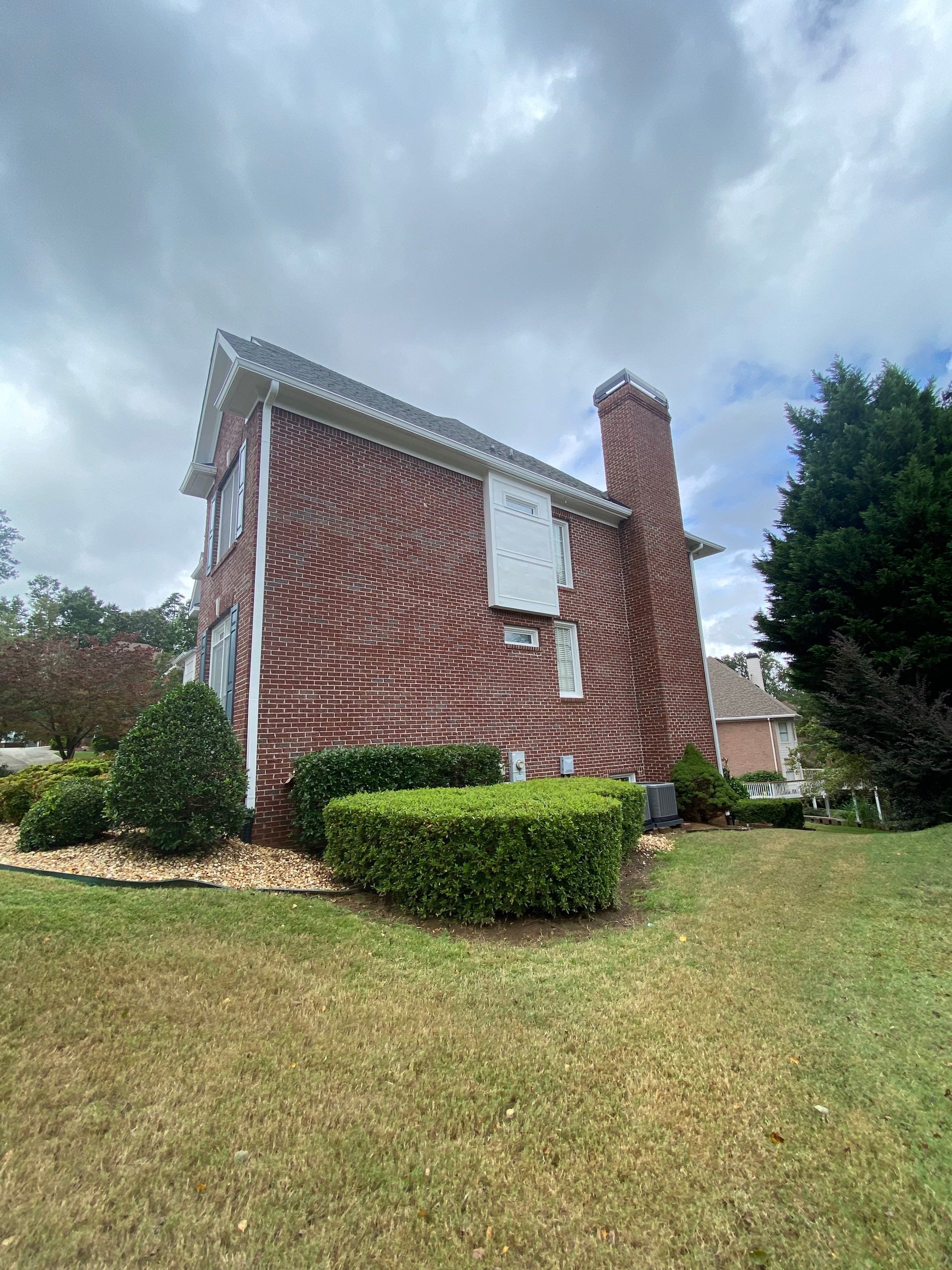 Exterior Painting and Trim Refresh for Duluth Brick Home by Swift Home Renovations