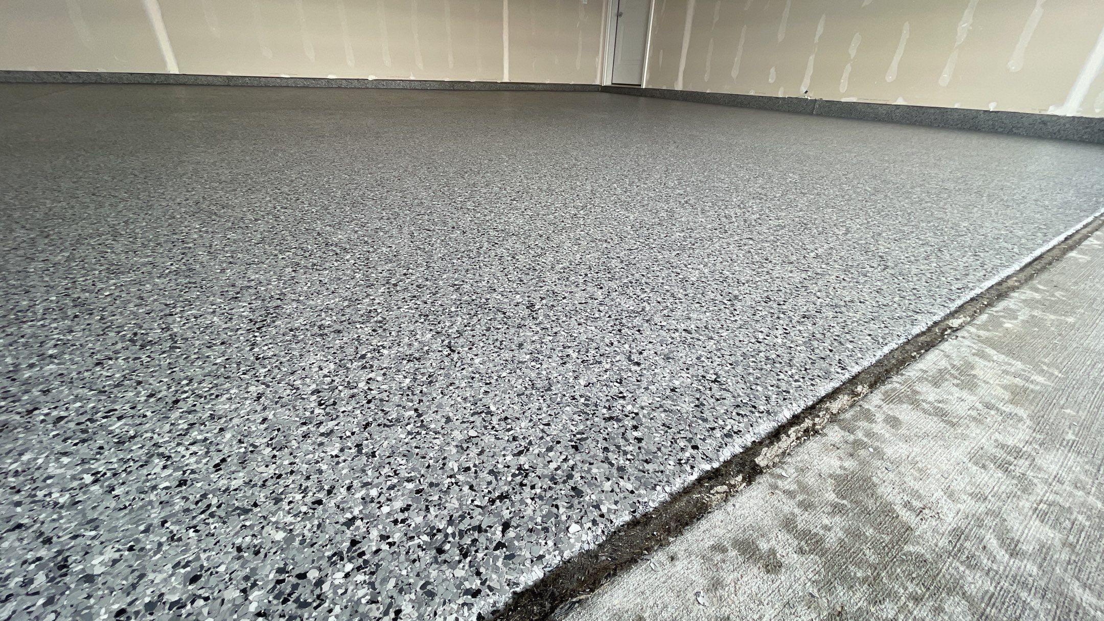 Garage Transformation using Nightfall by Croc Coatings, LLC