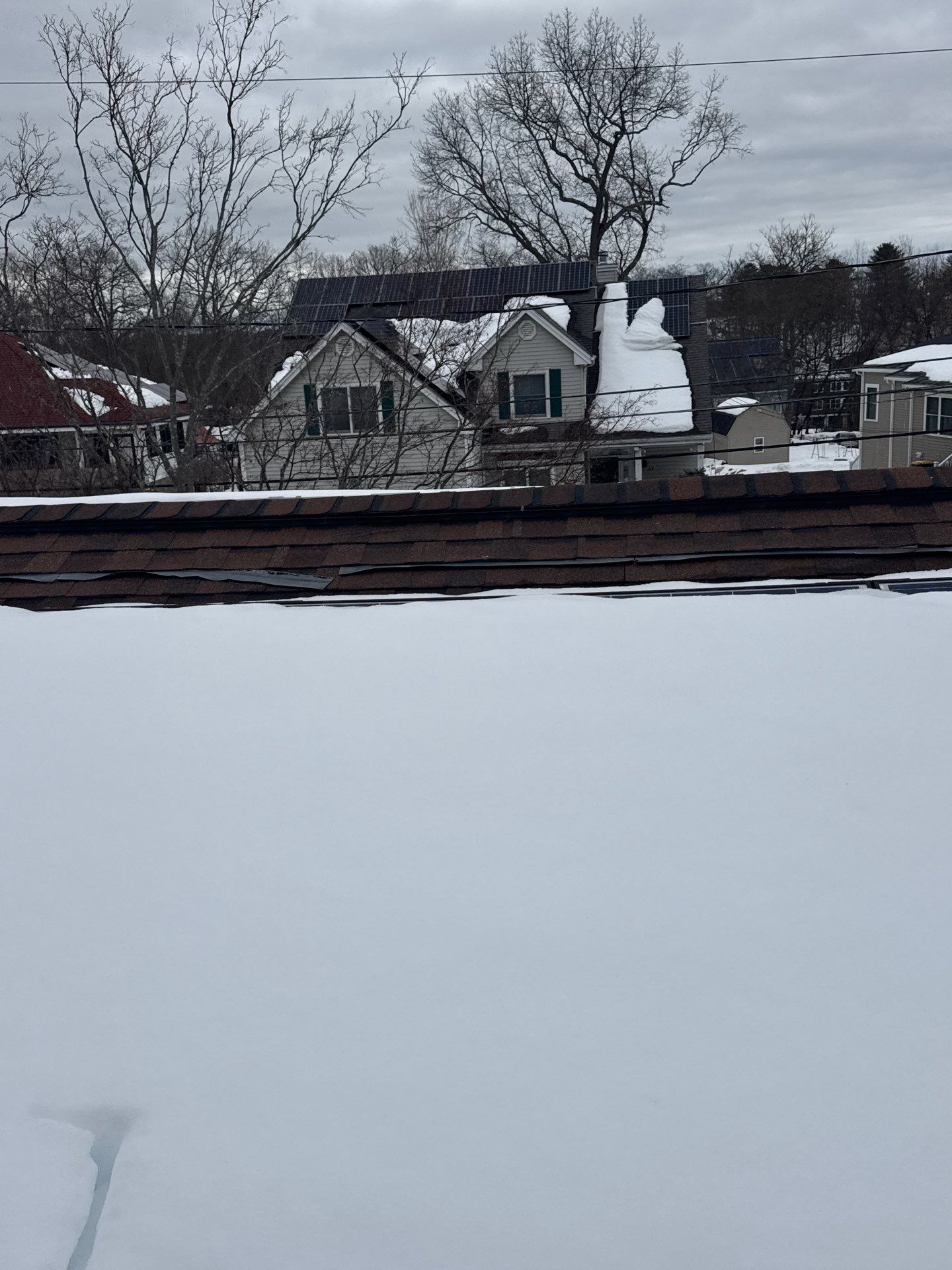 Ice Dam Removal & Snow Removal in Woburn, MA by Mighty Dog Roofing of Greater Middlesex County
