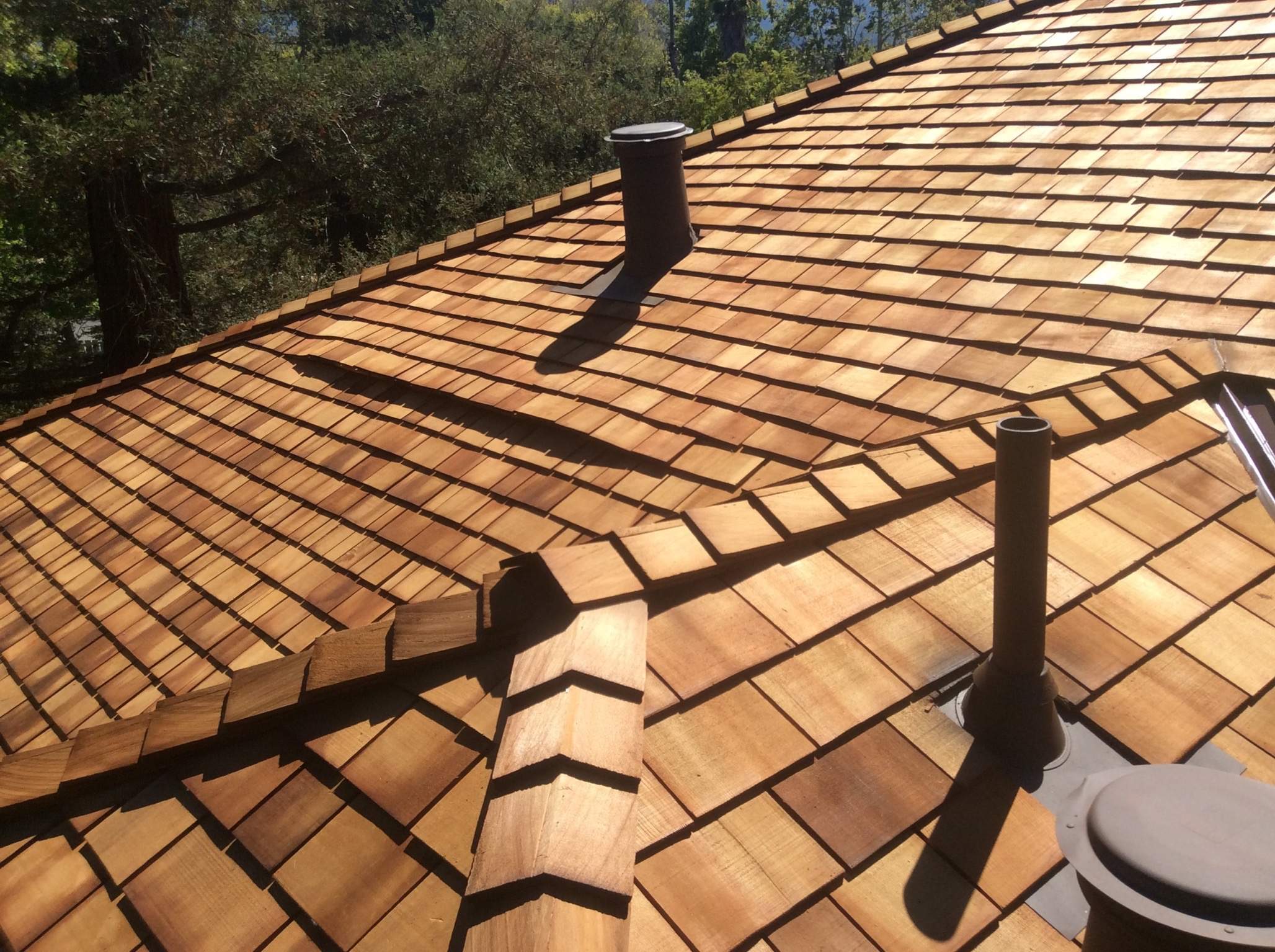 Custom Cedar Shake Roof Replacement for Saratoga Craftsman Home by Eastman Roofing & Waterproofing Inc.