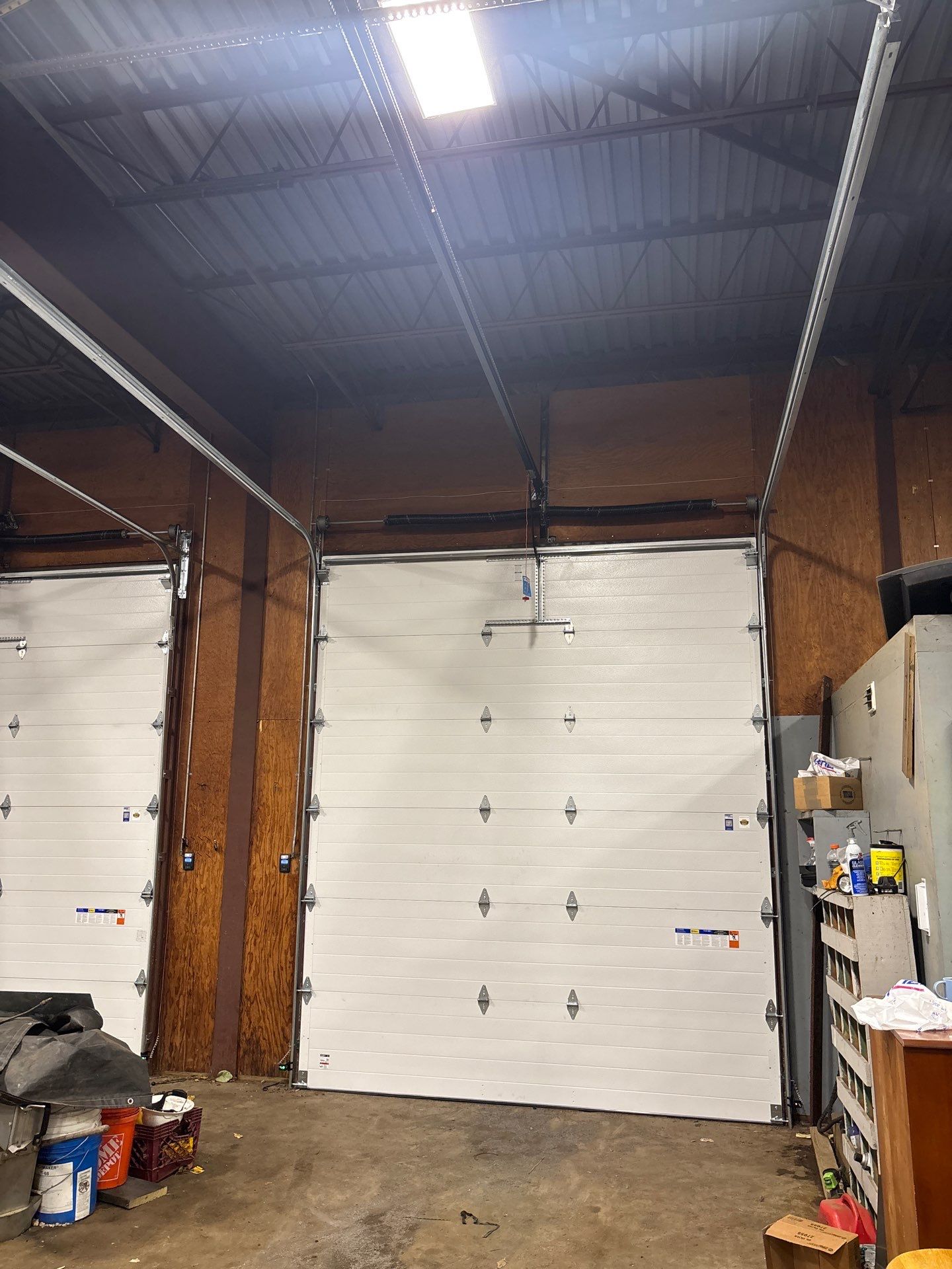 Commercial Door Installation using Clopay Modern Steel Garage Doors by Keene Door
