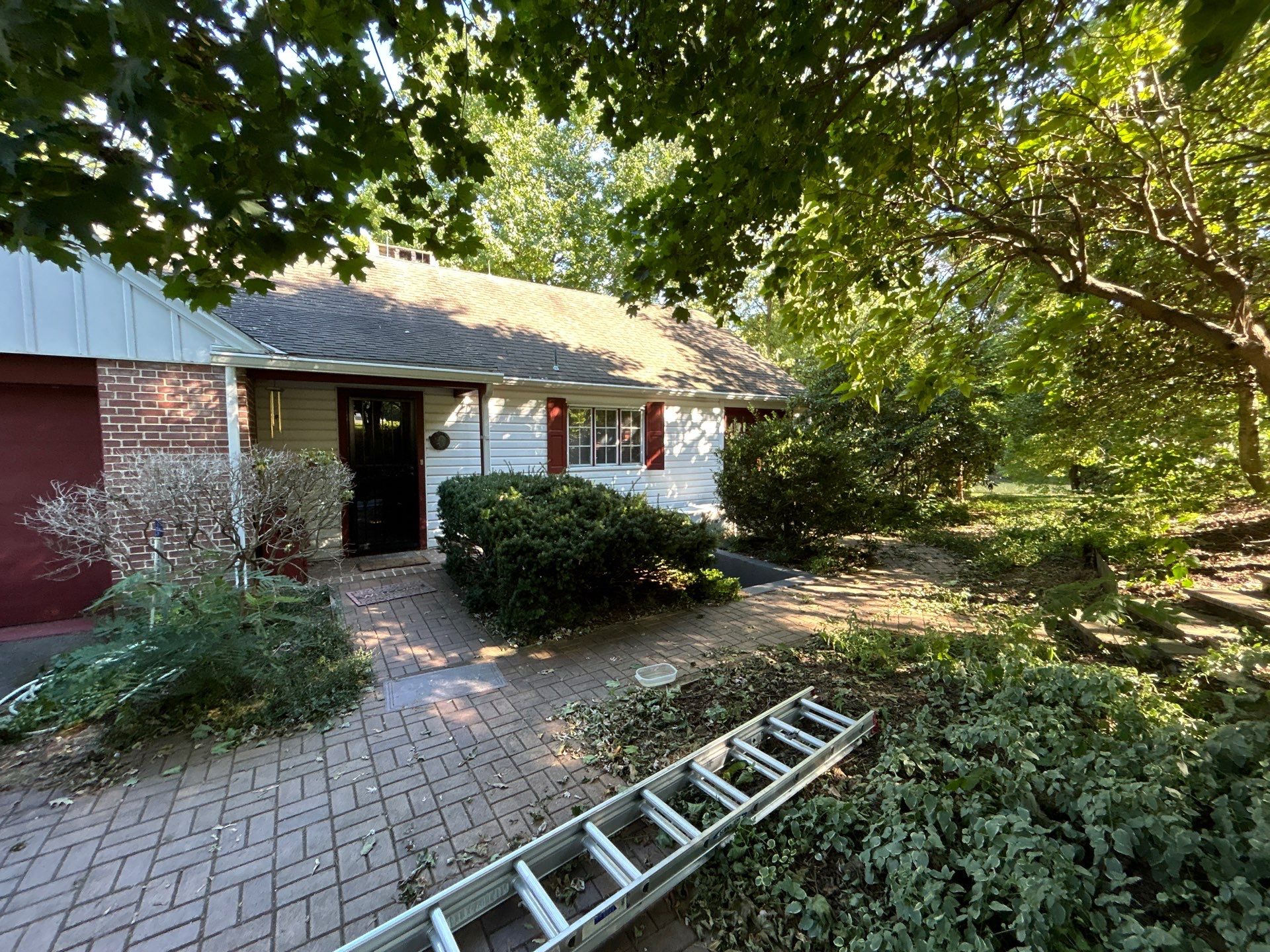 Red Metal Roofing Installation and Trim Restoration in Bernville by Esh Builders