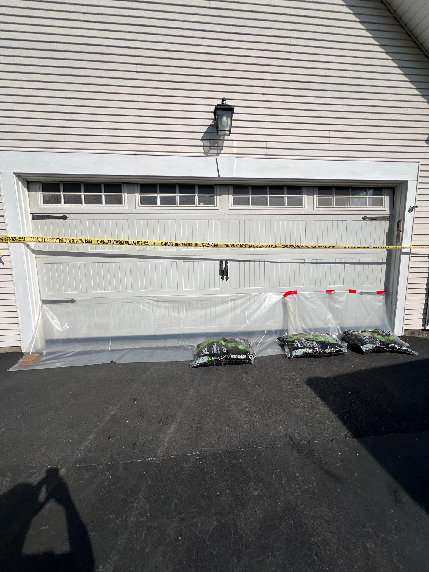 Silverado garage floor coating  by NG Masonry & Construction LLC