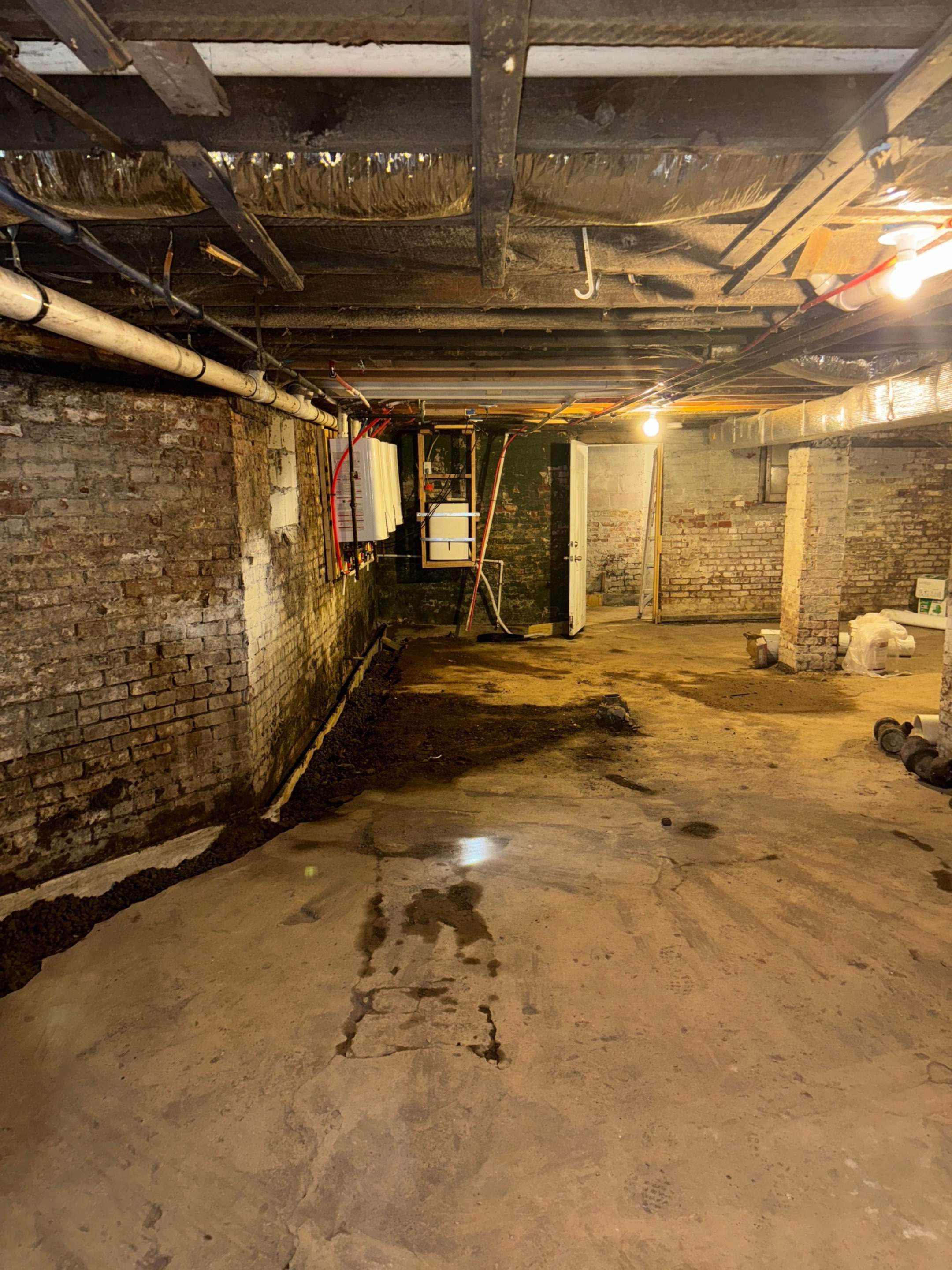 Interior French Drain & Wall Vapor Barrier in Newark, NJ  by Pure Service Pro, LLC 