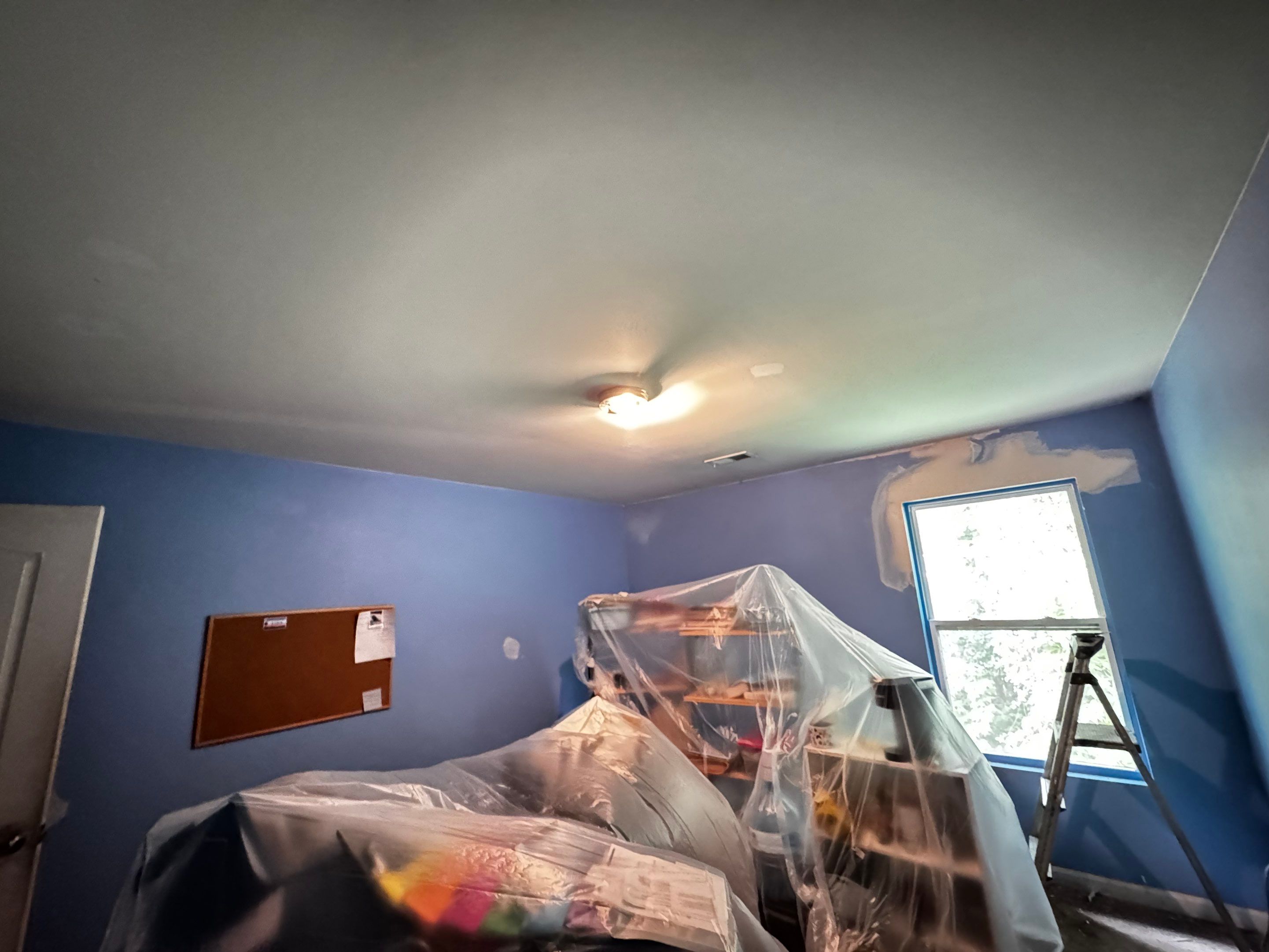 Bedroom Interior Painting and Professional Drywall Repair by PGP Surface Solutions, LLC