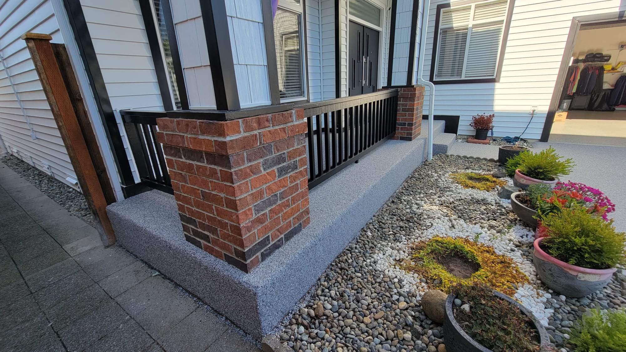 Poseidon Patio and Driveway by Concrete Coating Experts Inc.