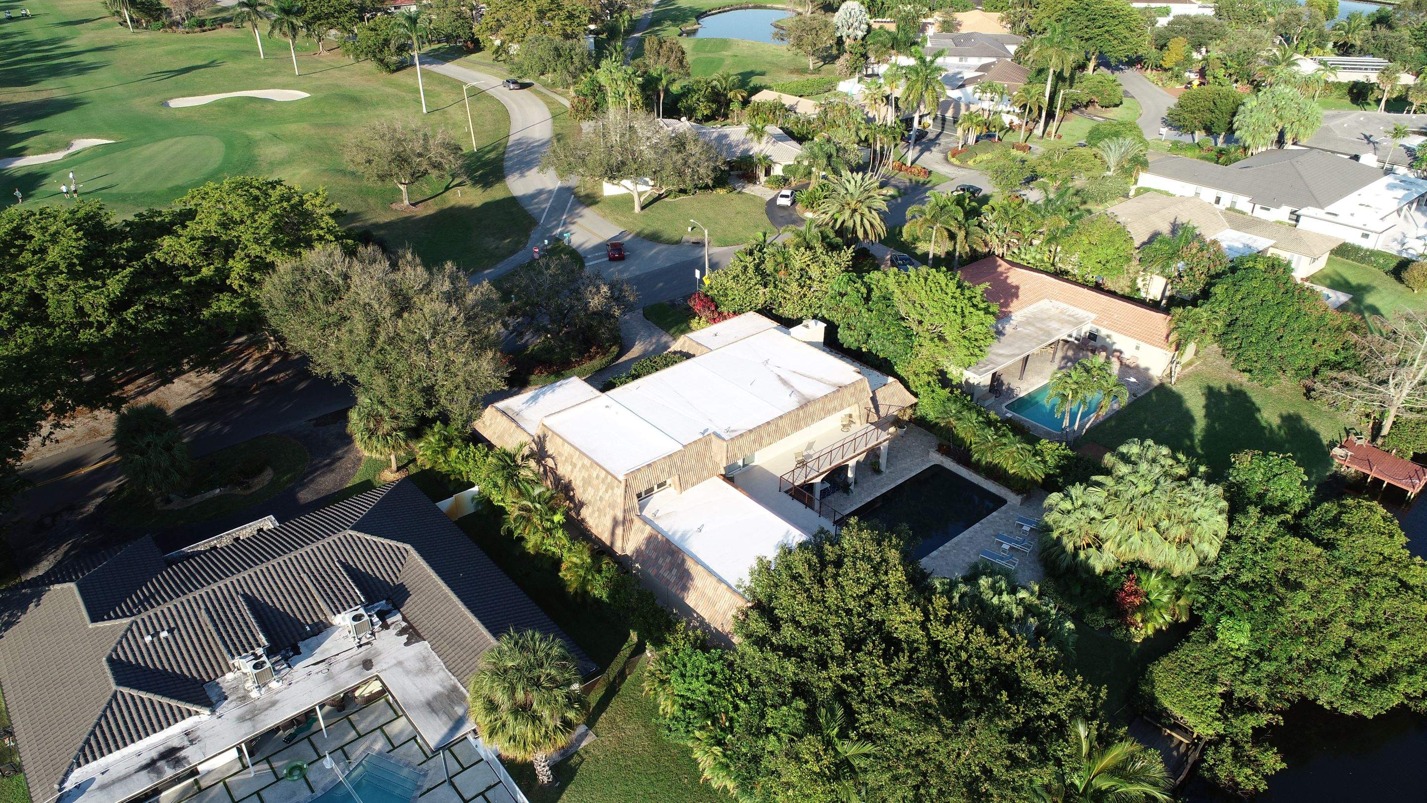 Amazing TPO flat deck re-roof with Eagle mansard in Hollywood Florida.  by First Due Roofing