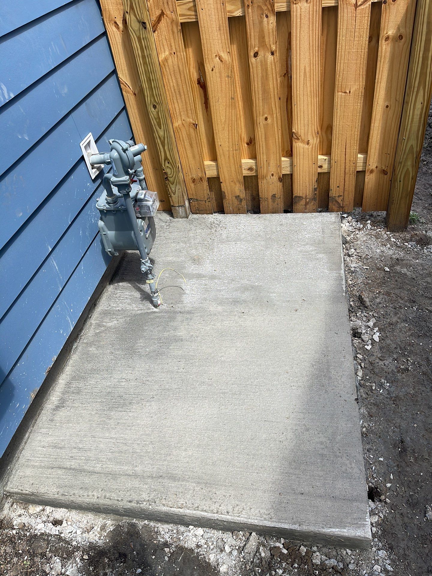 Concrete Patio Extension and Utility Line Preparation in Okatie by Lowcountry Scapes, LLC