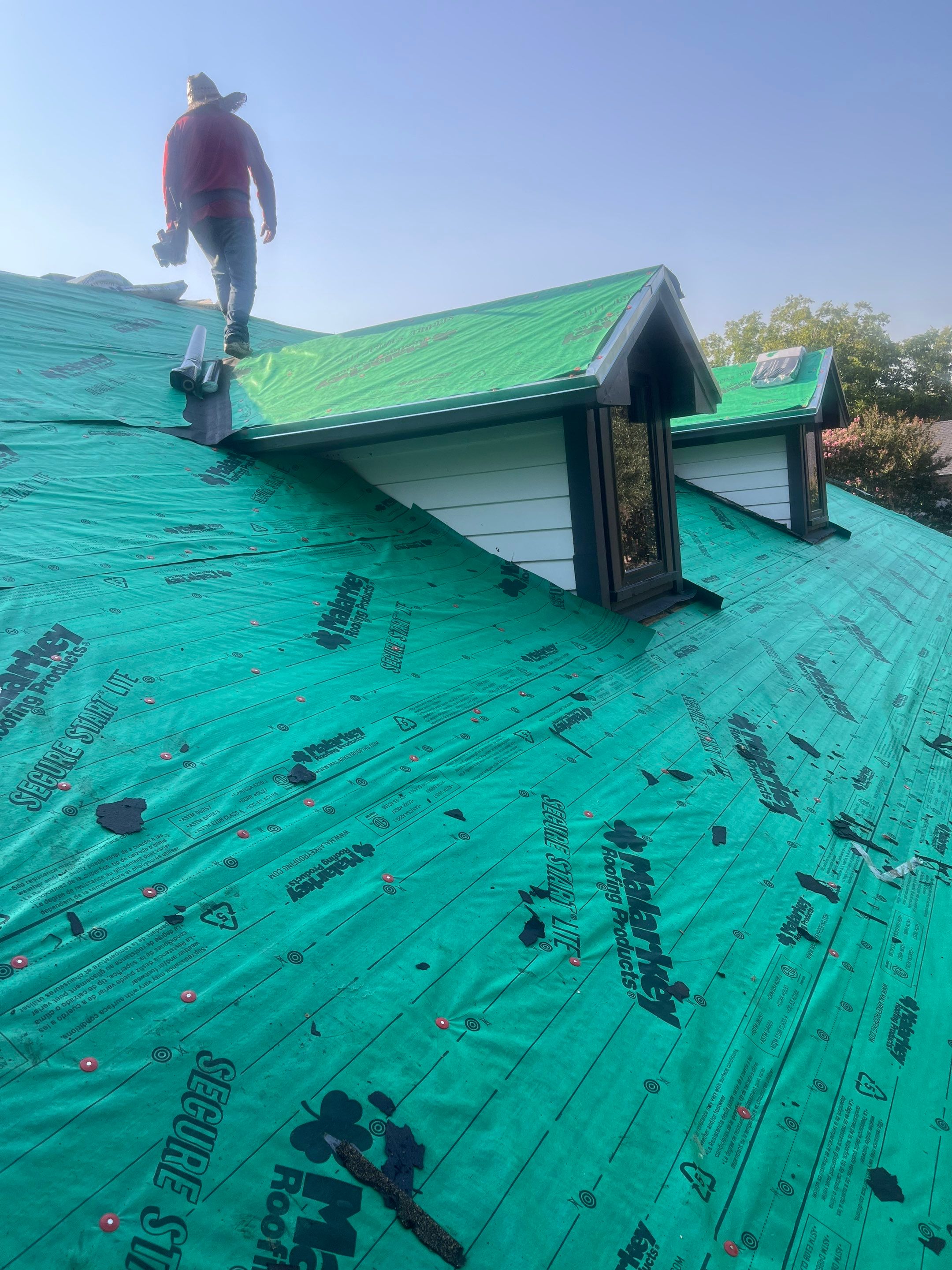 Reroof + Gutters by Berry Good Roofing