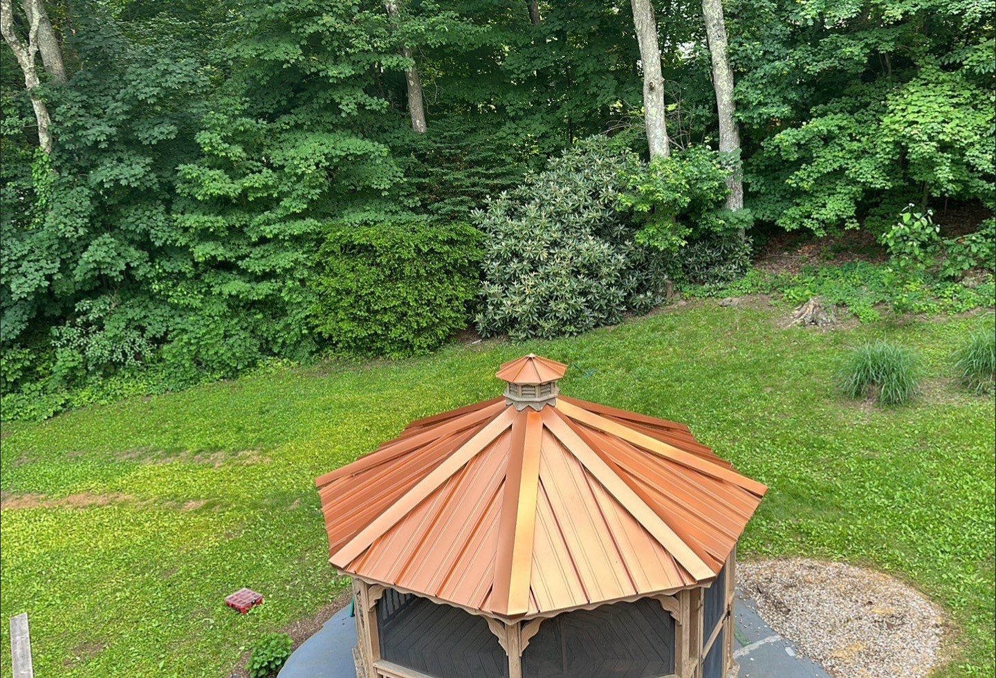 Residential Roofing Installation using Copper Penny Metal Roof by A Plus Exterior