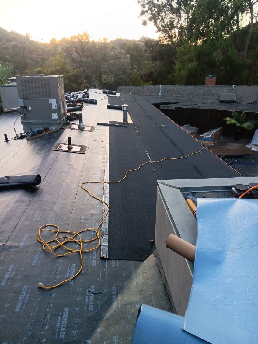 Residential Roofing Installation using Polyfresko® G Highly Reflective Modified Bitumen Cap Sheet by Hull Brothers Roofing