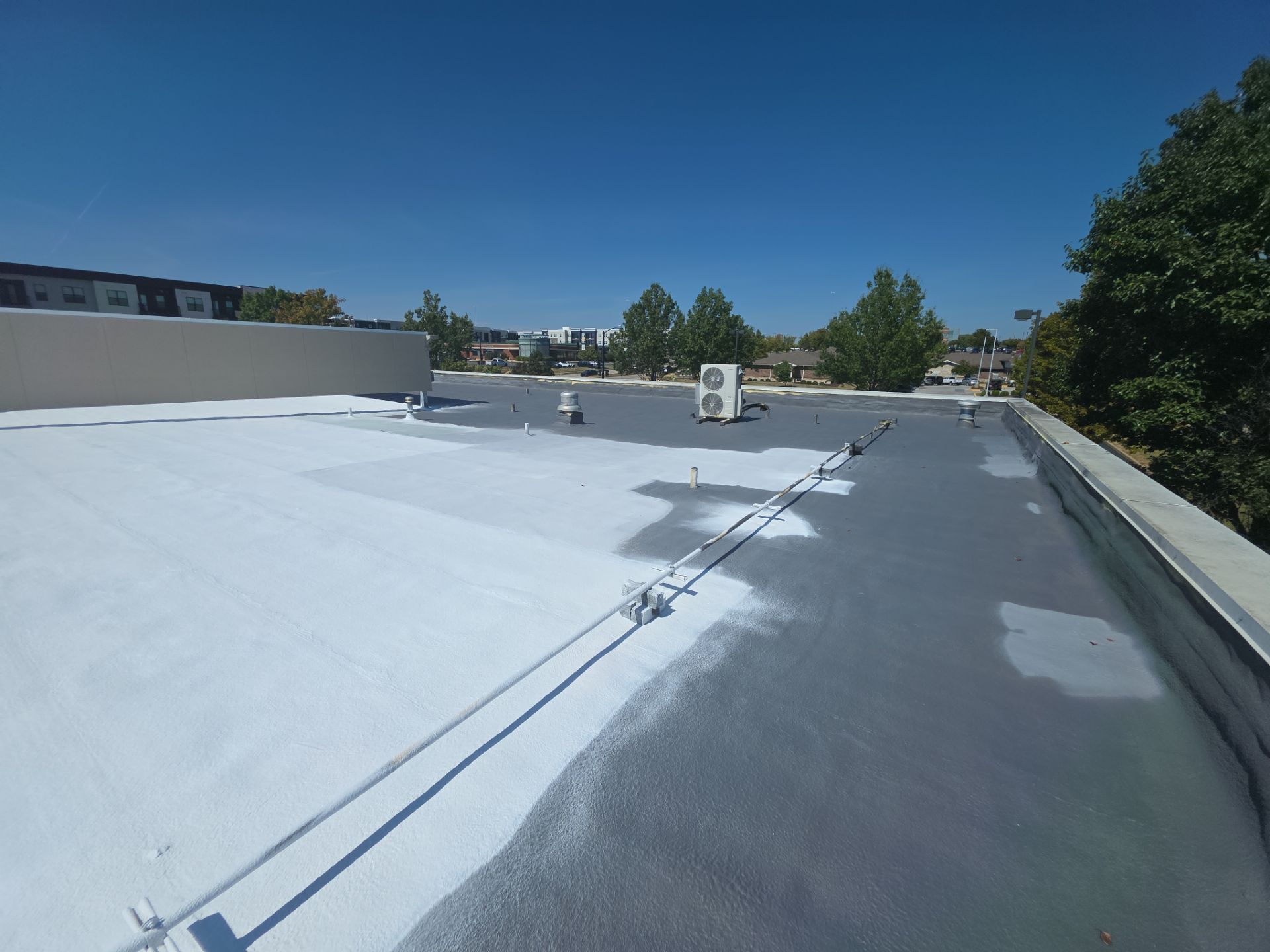 Commercial Roofing Install - SPF Foam & Coatings Restoration & EPDM System - Color White  by Titan Commercial & Residential Roofing 