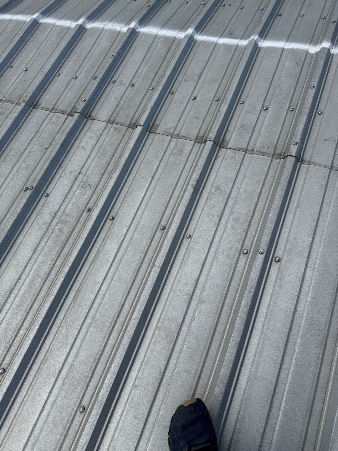 Metal Roof Fastener Replacement and Seam Sealing in West Point, NE by Crows Roofing LLC