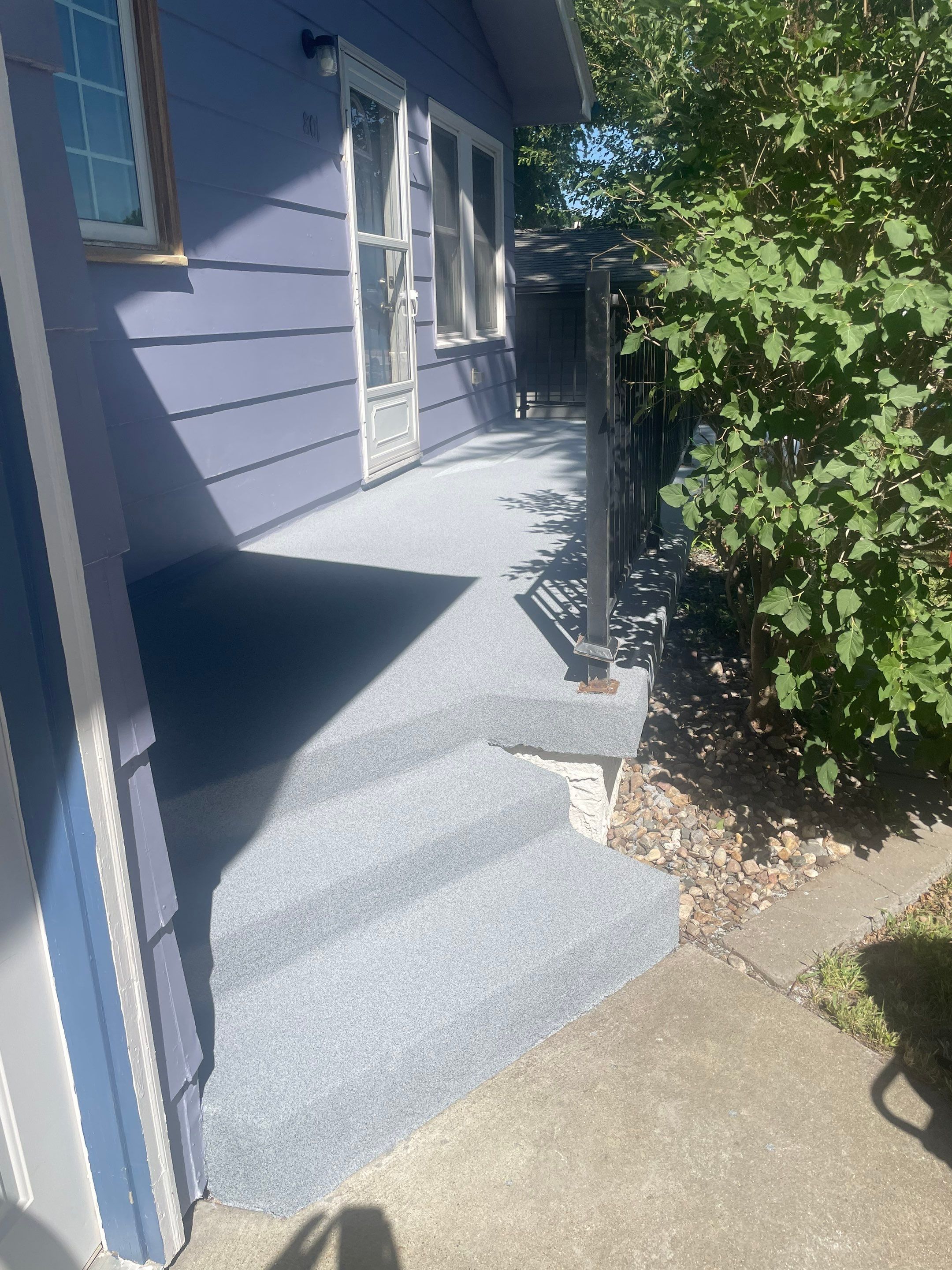 Sioux Falls Concrete Porch Coating with Starry Evening Finish by Select Painting, Coatings & Garage Cabinets