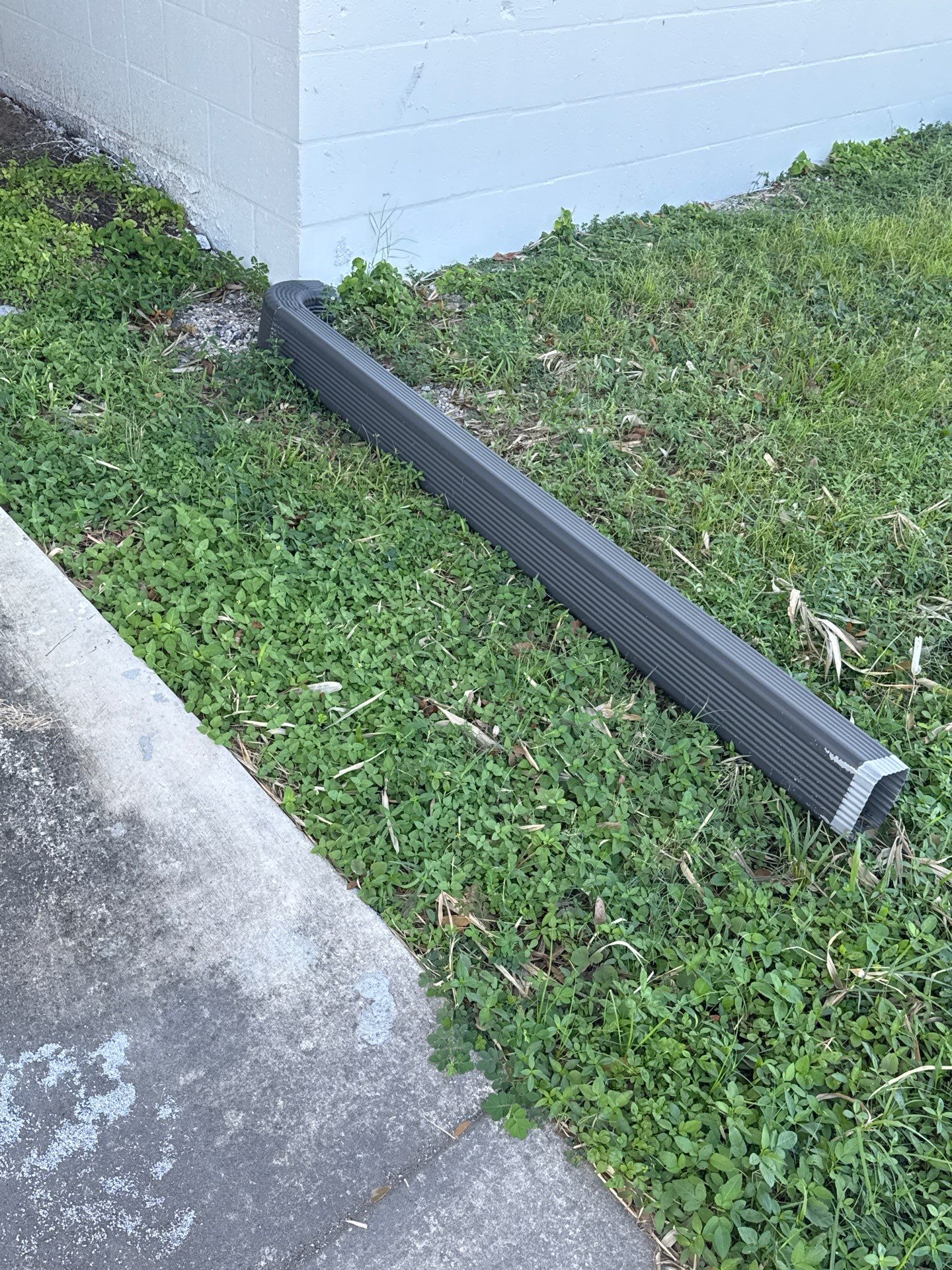 Black Seamless Gutters for Modern Homes in Sarasota FL by Gutter Professors