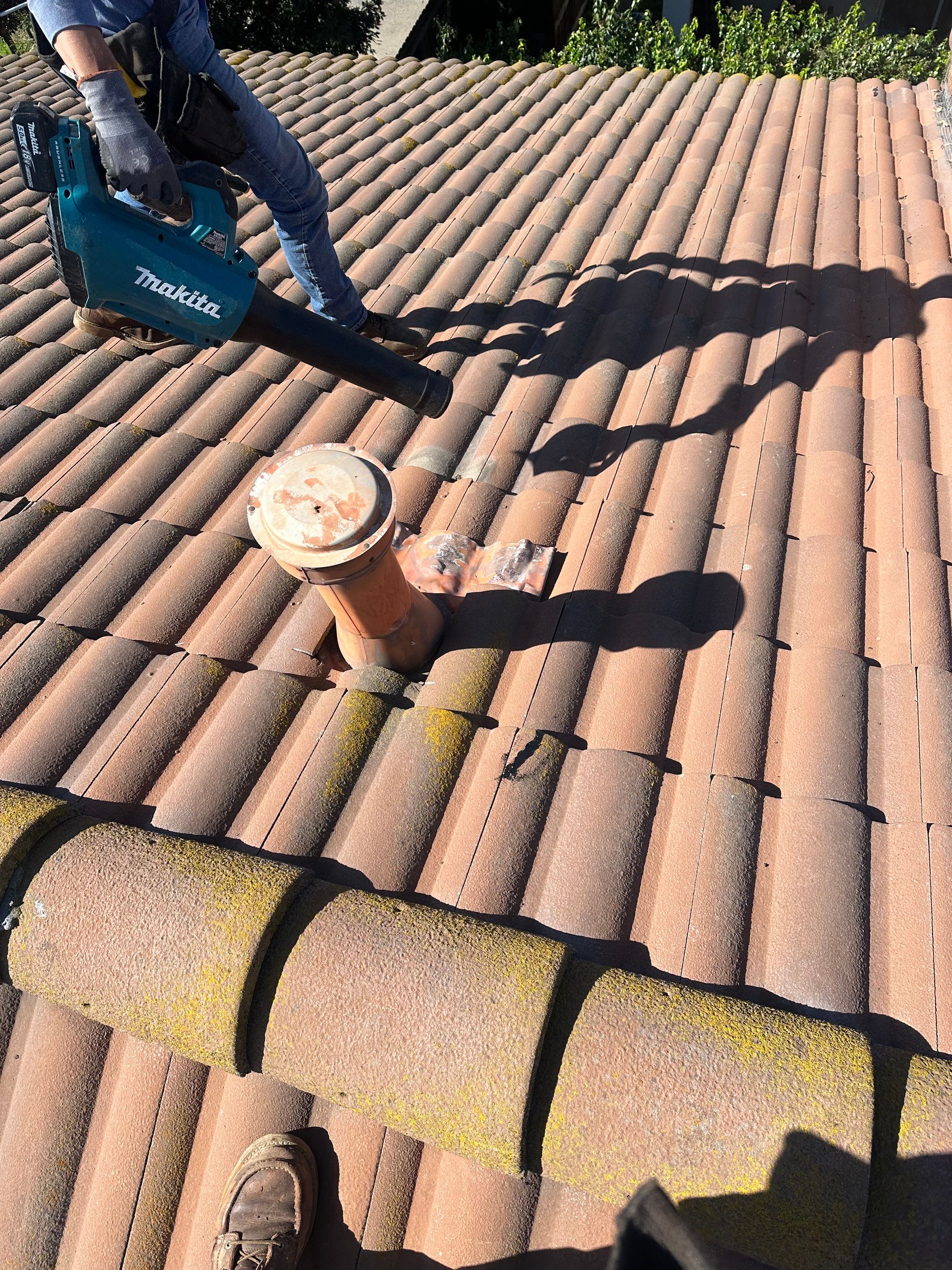 Tile Roof repair by Grandmark Service Company