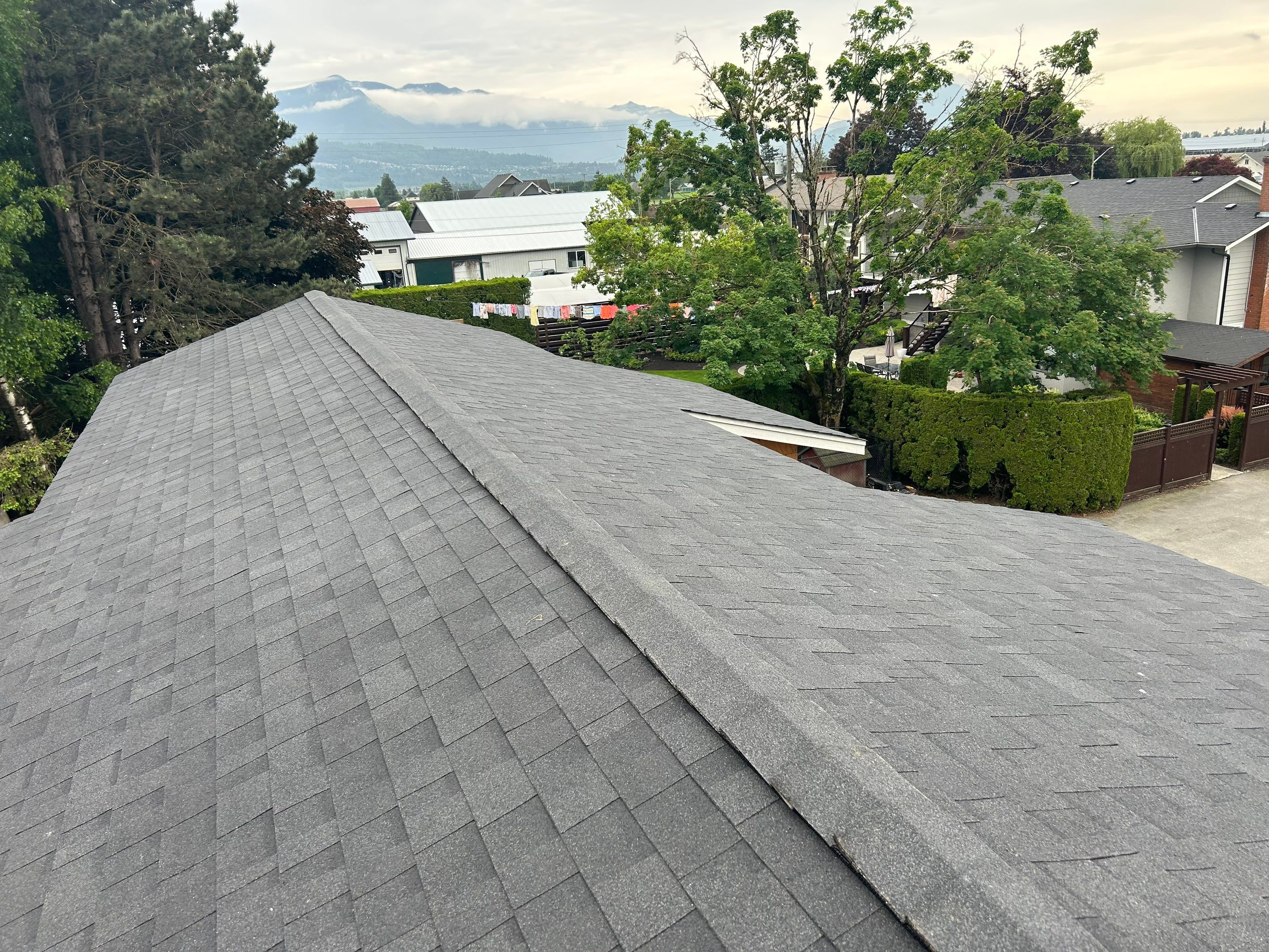 Residential Roofing Installation using OC Oakridge shingles by Top Notch Roofing Inc