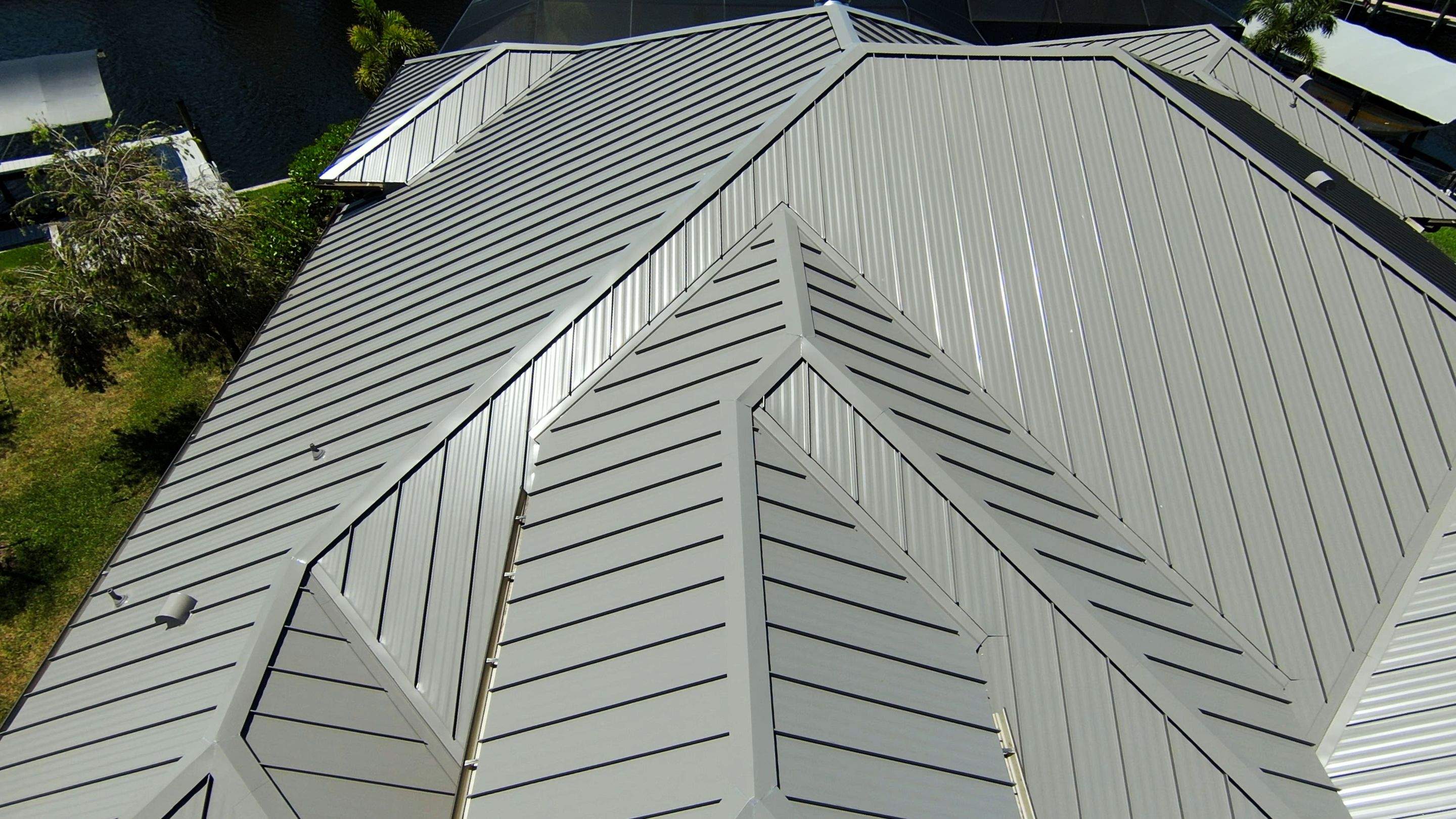 Residential Roofing Installation using Gulf Coast Metals Gulf Seam Panels by Four Peaks Roofing
