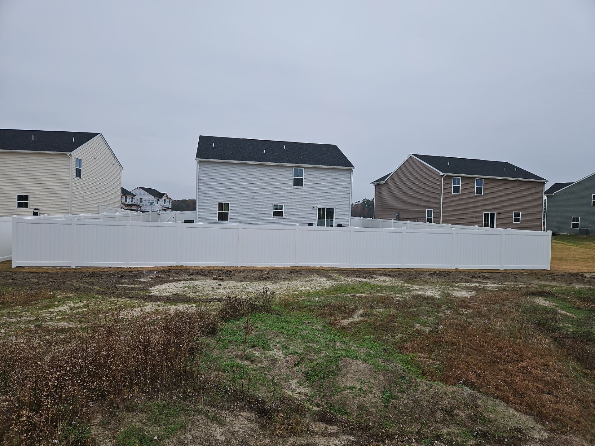 A Perfect Fence for a Brand-New Home by Tidewater Fence