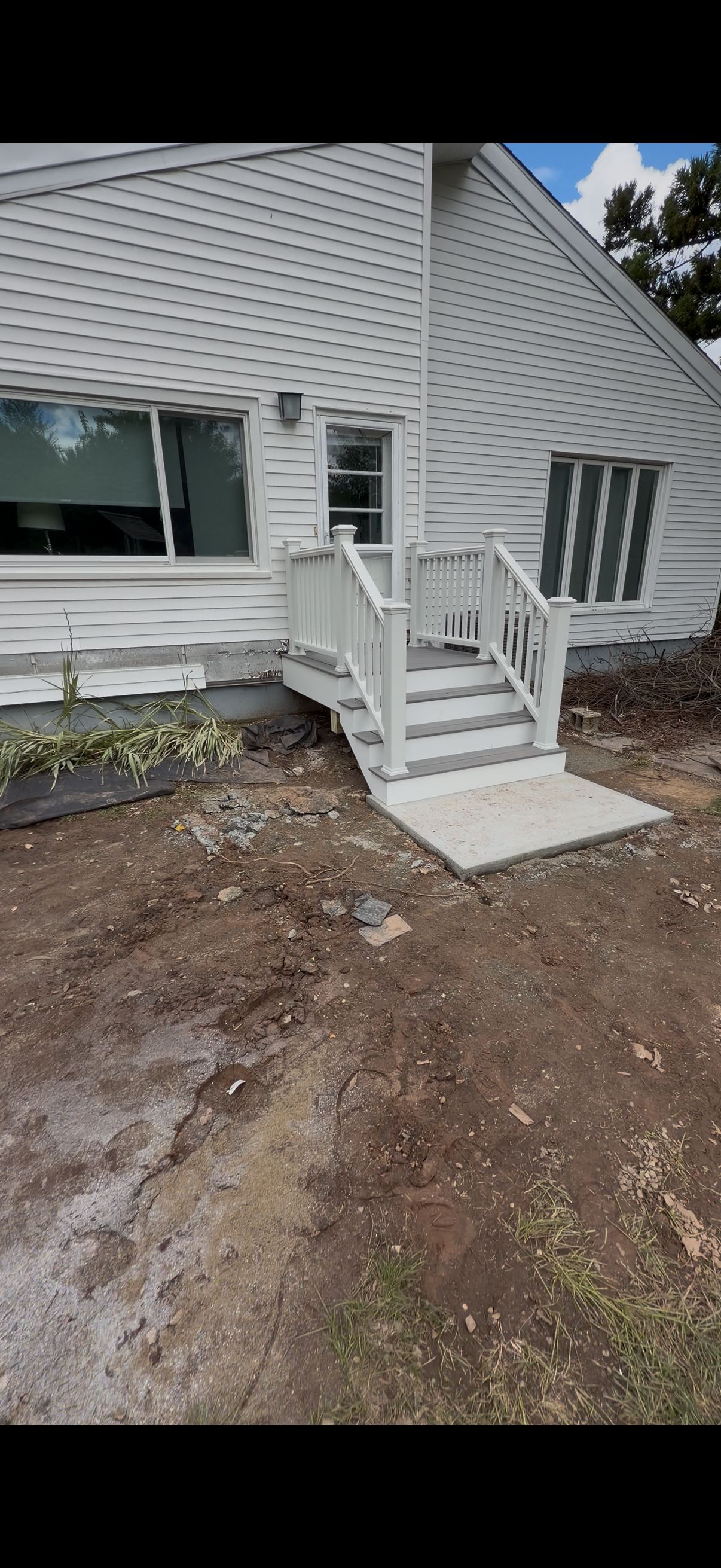 Deck and Ramp replacement using Trex Select Millstone, Trex transcend White Railings  by DiGiorgi Roofing and Siding Inc